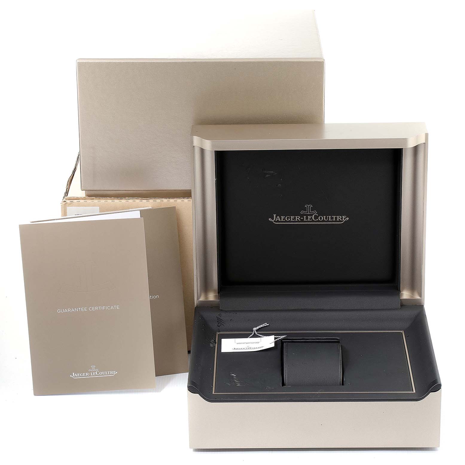 The image shows the original box, guarantee certificates, and packaging of a Jaeger-LeCoultre Master model watch.
