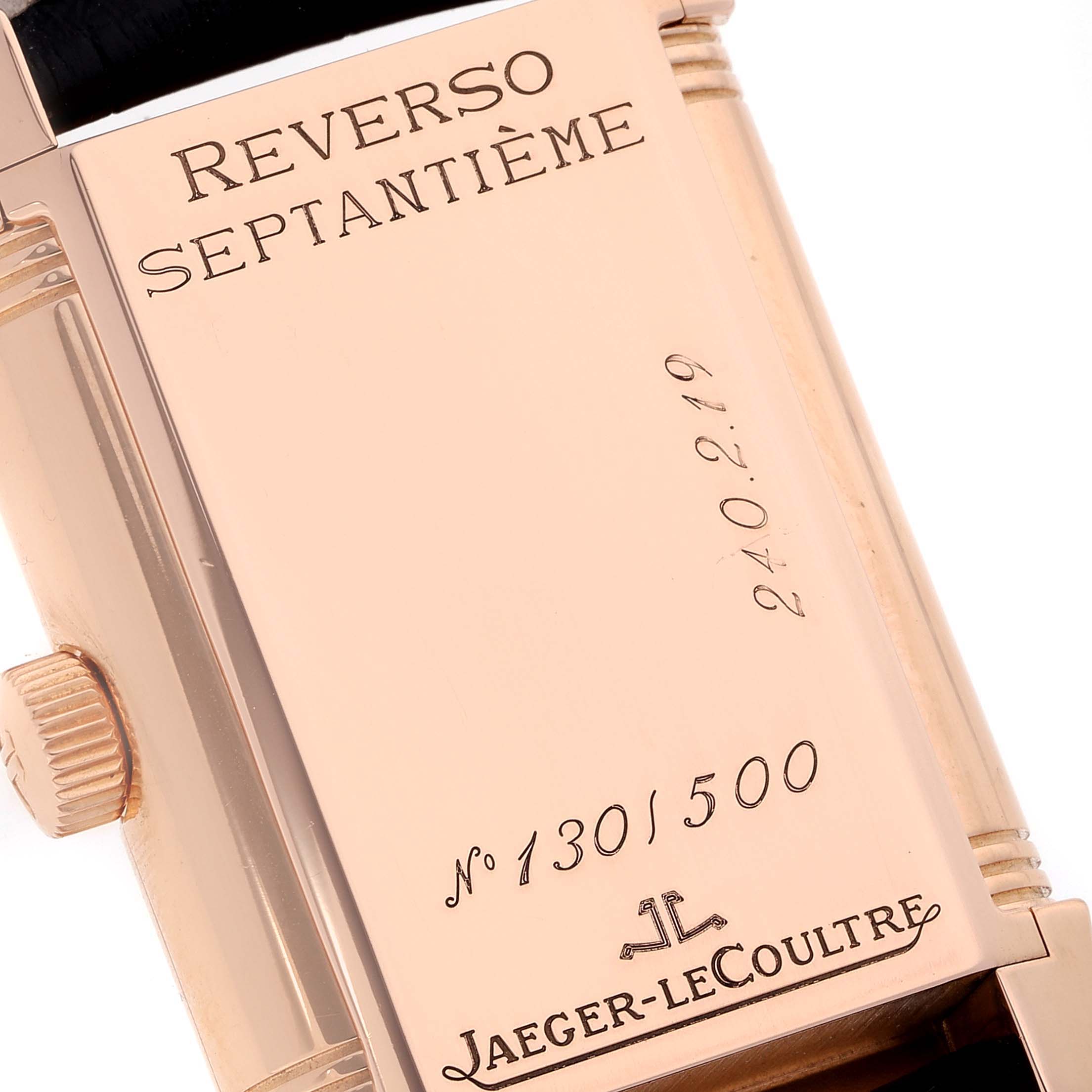 The image shows the back of the Jaeger-LeCoultre Reverso Septantième watch, highlighting the engraved information and crown.