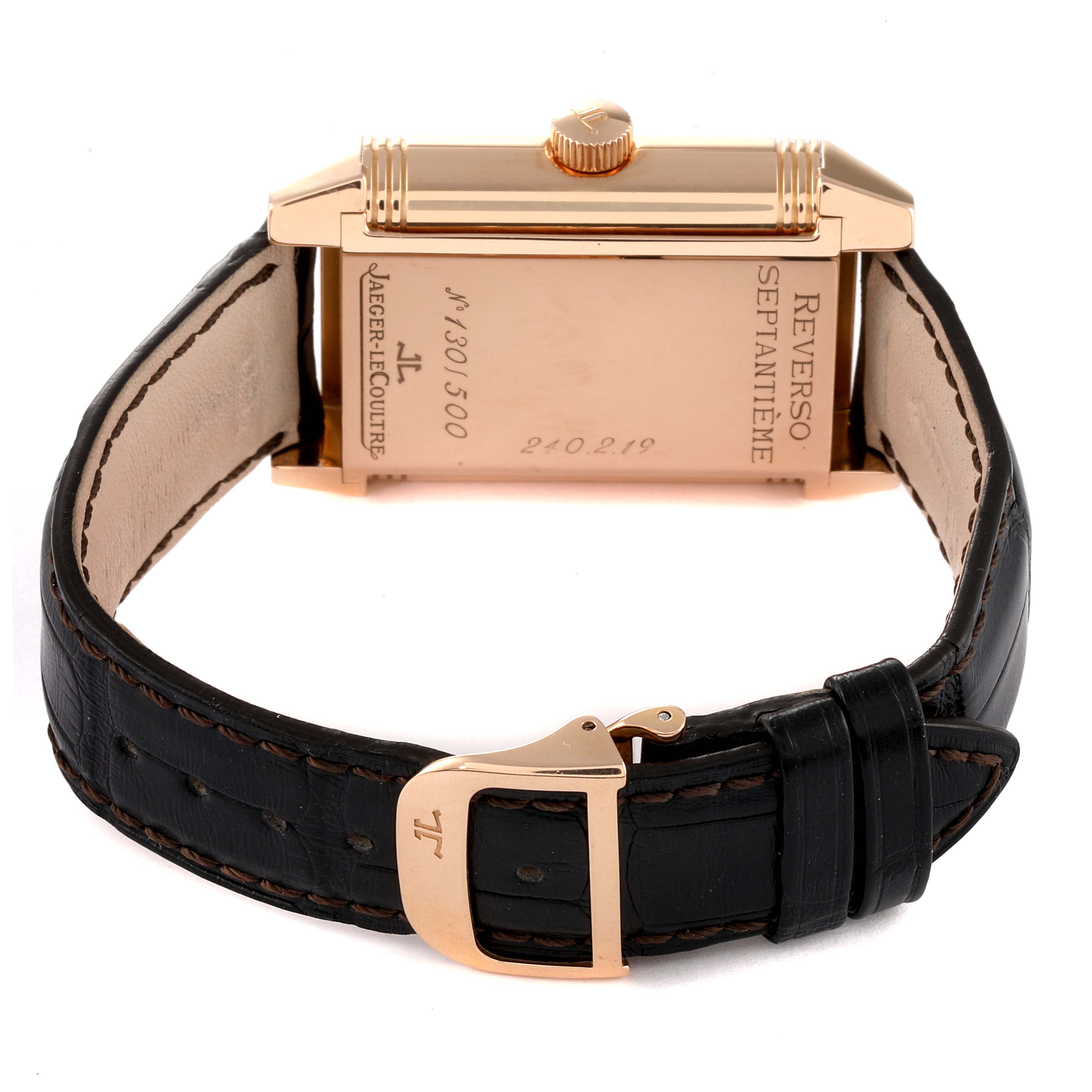 This image shows the back view of a Jaeger LeCoultre Reverso Q3002420 Men's Rose Gold Silver Dial Q3002420 Men's Rose Gold Silver Dial watch, highlighting the case back, crown, and leather strap with buckle.