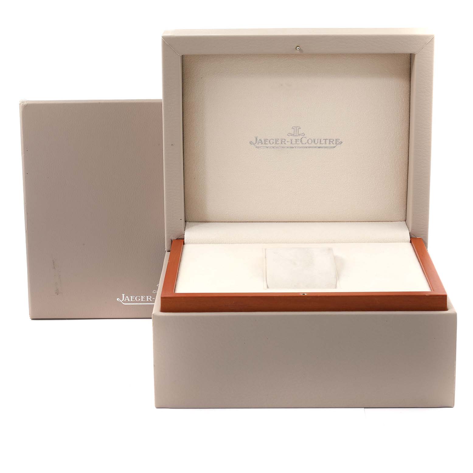 This image shows an empty watch box for the Jaeger-LeCoultre Reverso model, photographed from the front angle.