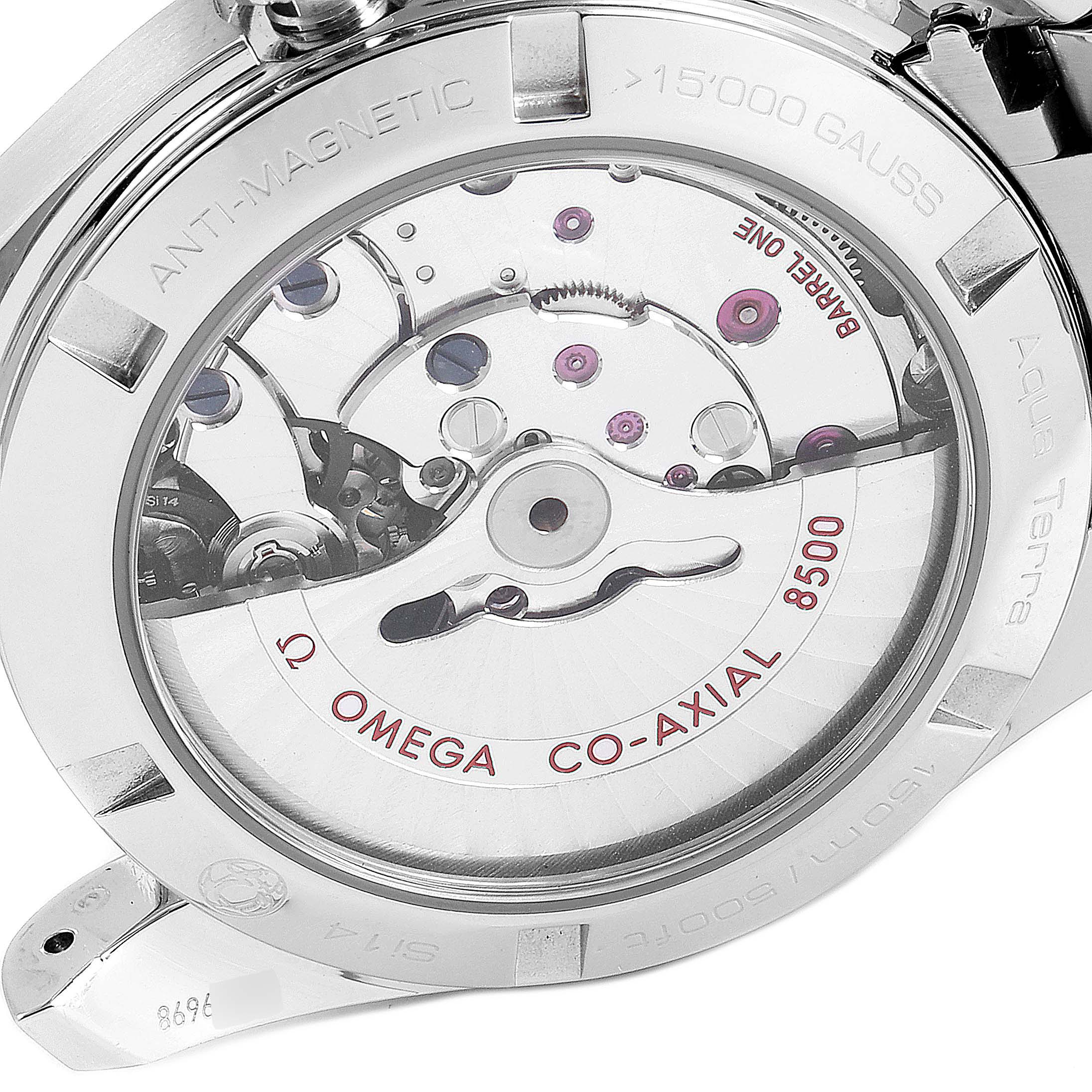 The image shows the Omega Aqua Terra 231.10.39.21.01.002 Men's Stainless Steel Black Dial 231.10.39.21.01.002 Men's Stainless Steel Black Dial watch from a rear angle, highlighting its movement and the inscribed case back.