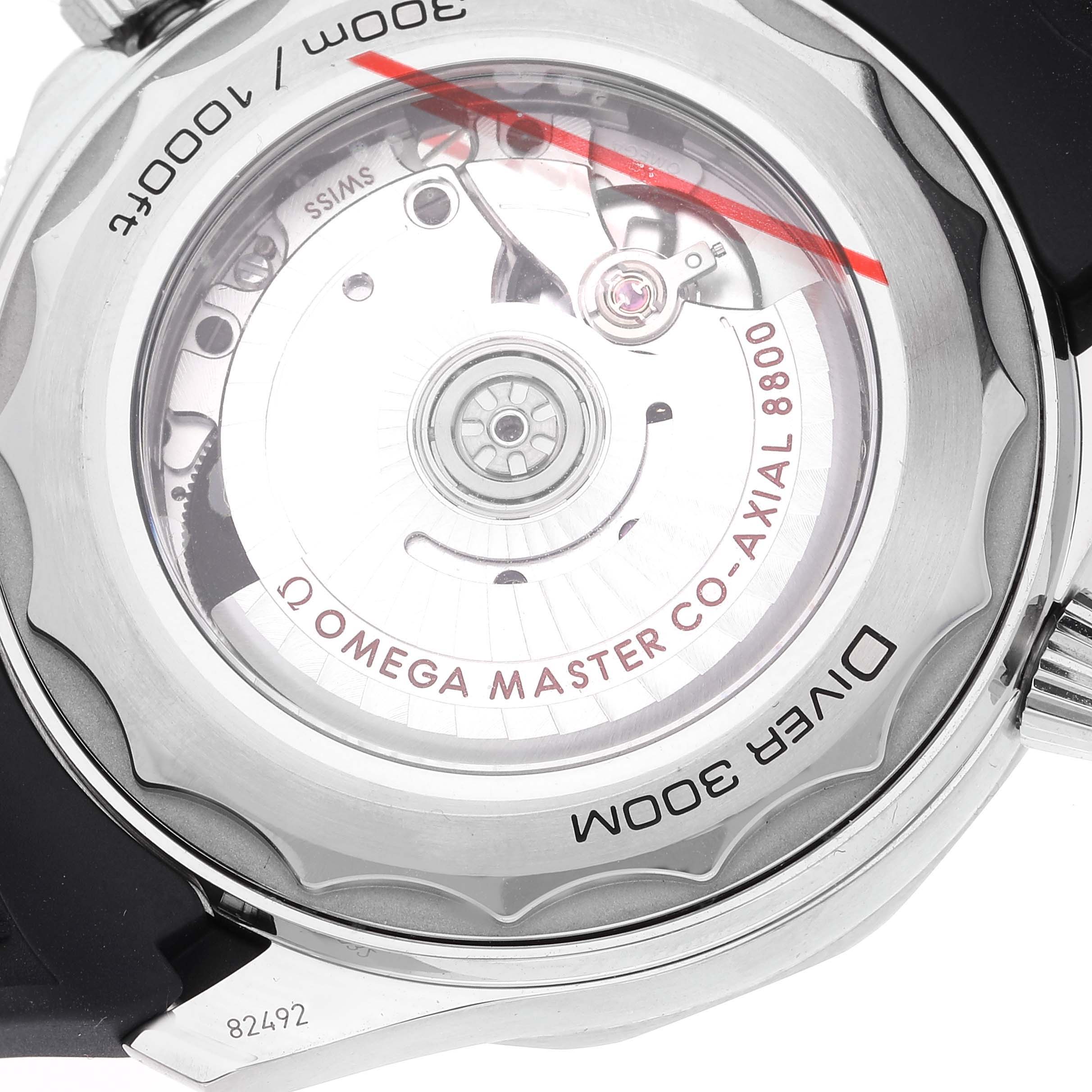 The image shows the case back of an Omega Seamaster 210.32.42.20.04.001 Men's Stainless Steel White Dial 210.32.42.20.04.001 Men's Stainless Steel White Dial watch, revealing its internal mechanism and "Diver 300M" markings.