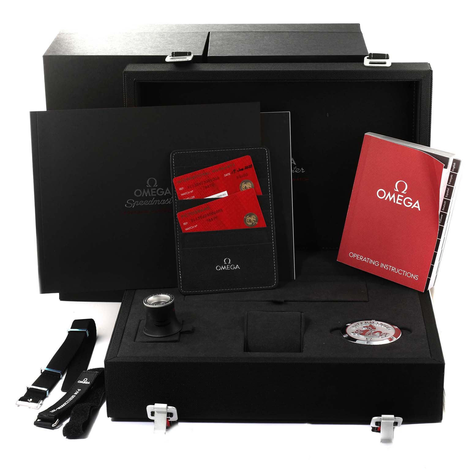 This image shows the packaging, instruction manual, warranty cards, straps, magnifying glass, and accessories for an Omega Speedmaster 311.30.42.30.01.005 Men's Stainless Steel Black Dial 311.30.42.30.01.005 Men's Stainless Steel Black Dial watch.