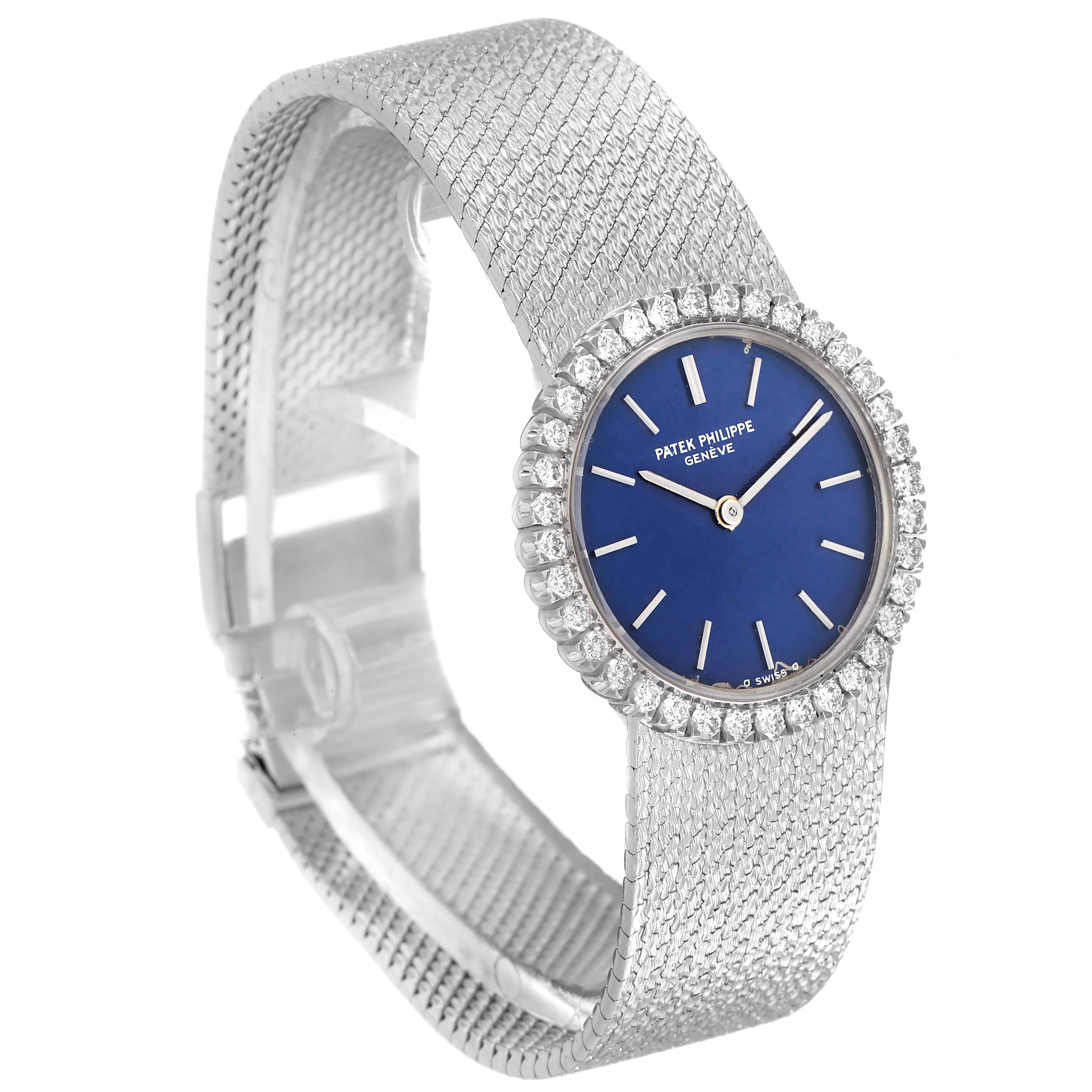 This image shows a side view of a Patek Philippe Calatrava 4182 Women's White Gold Blue Dial 4182 Women's White Gold Blue Dial watch, highlighting its blue dial and diamond-studded bezel.