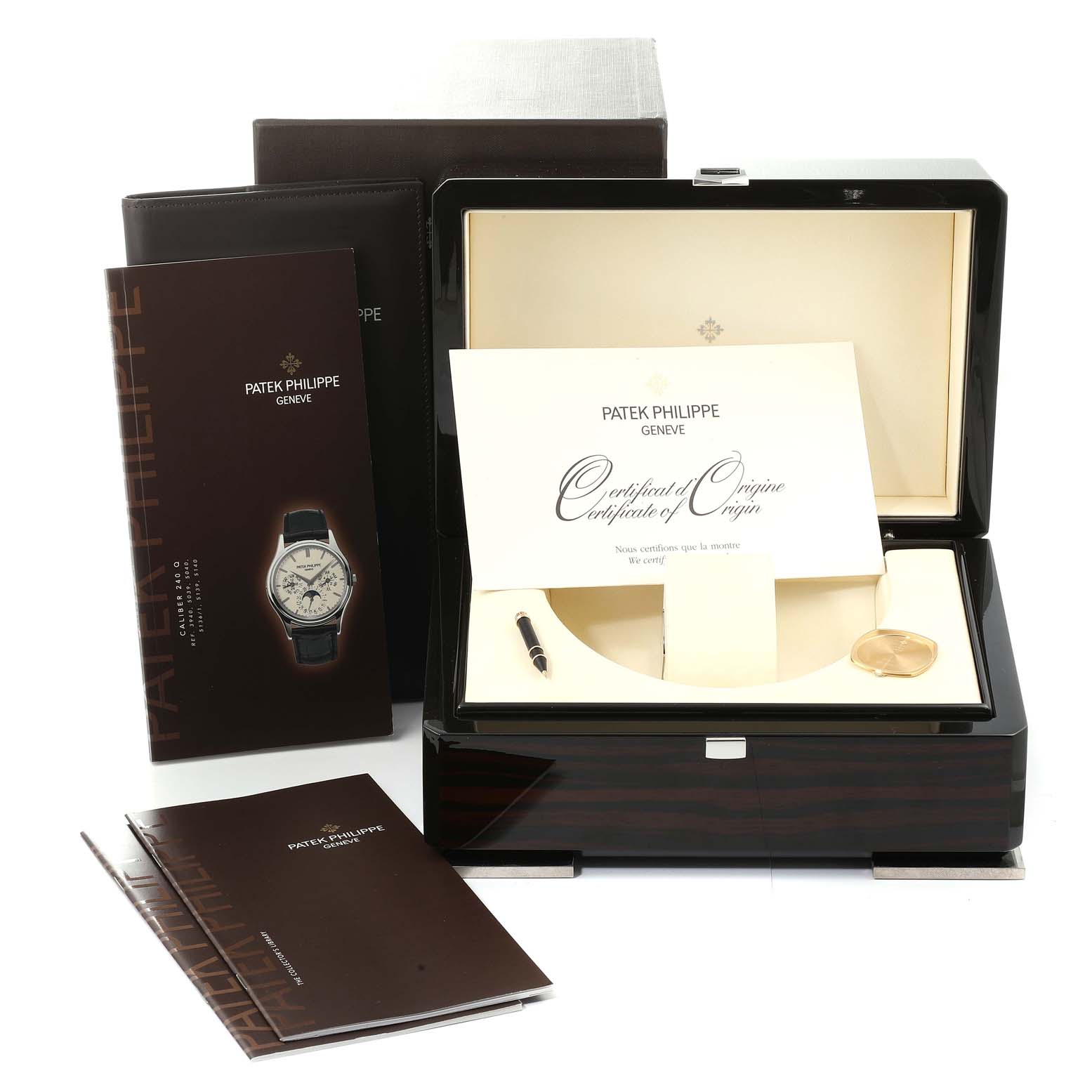 The image displays the box, certificate, and manuals for the Patek Philippe Complications 5940J - 001 Men's Yellow Gold Silver Dial 5940J - 001 Men's Yellow Gold Silver Dial model.