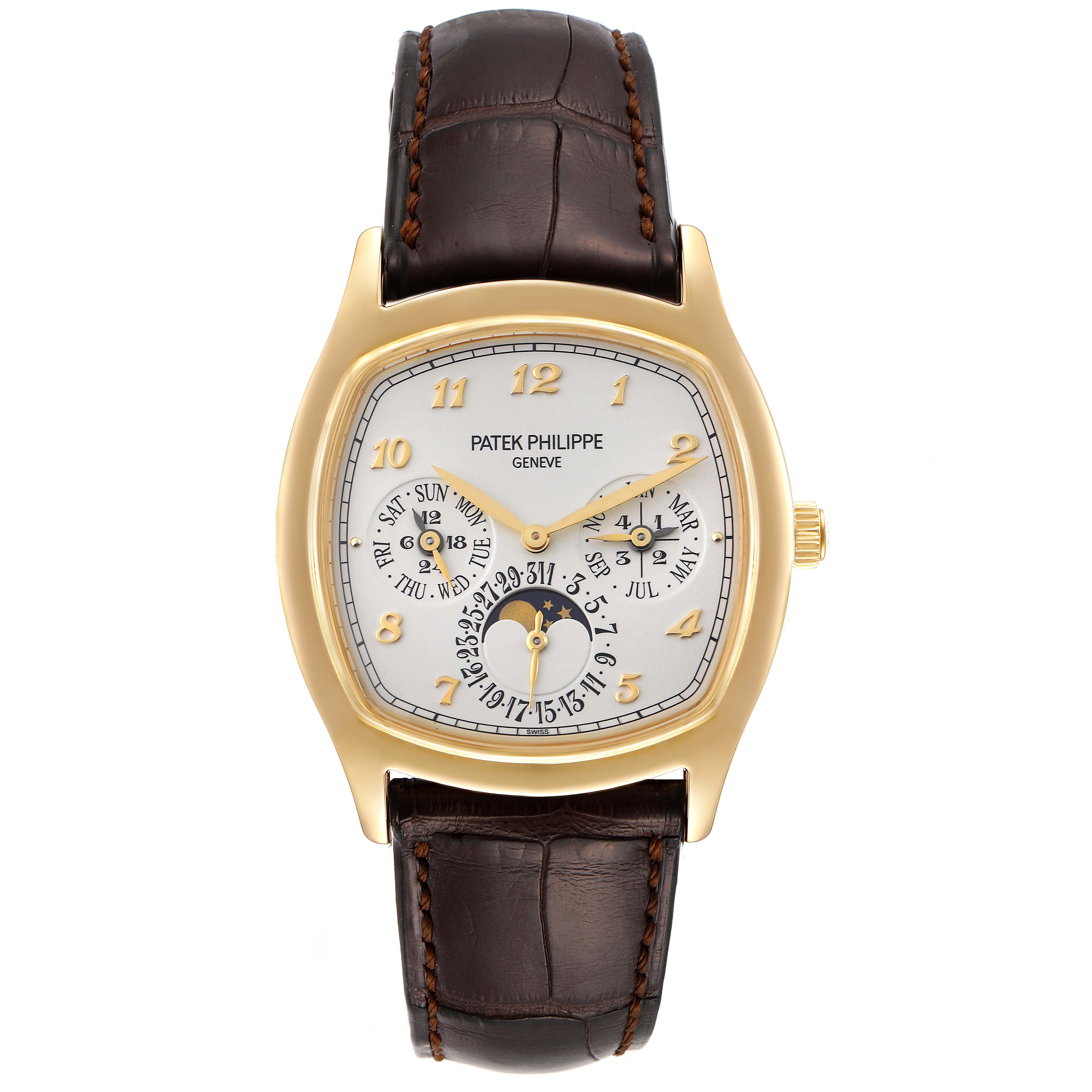 The image shows a straight-on view of the Patek Philippe Complications 5940J - 001 Men's Yellow Gold Silver Dial 5940J - 001 Men's Yellow Gold Silver Dial watch, highlighting the dial, case, and leather strap.