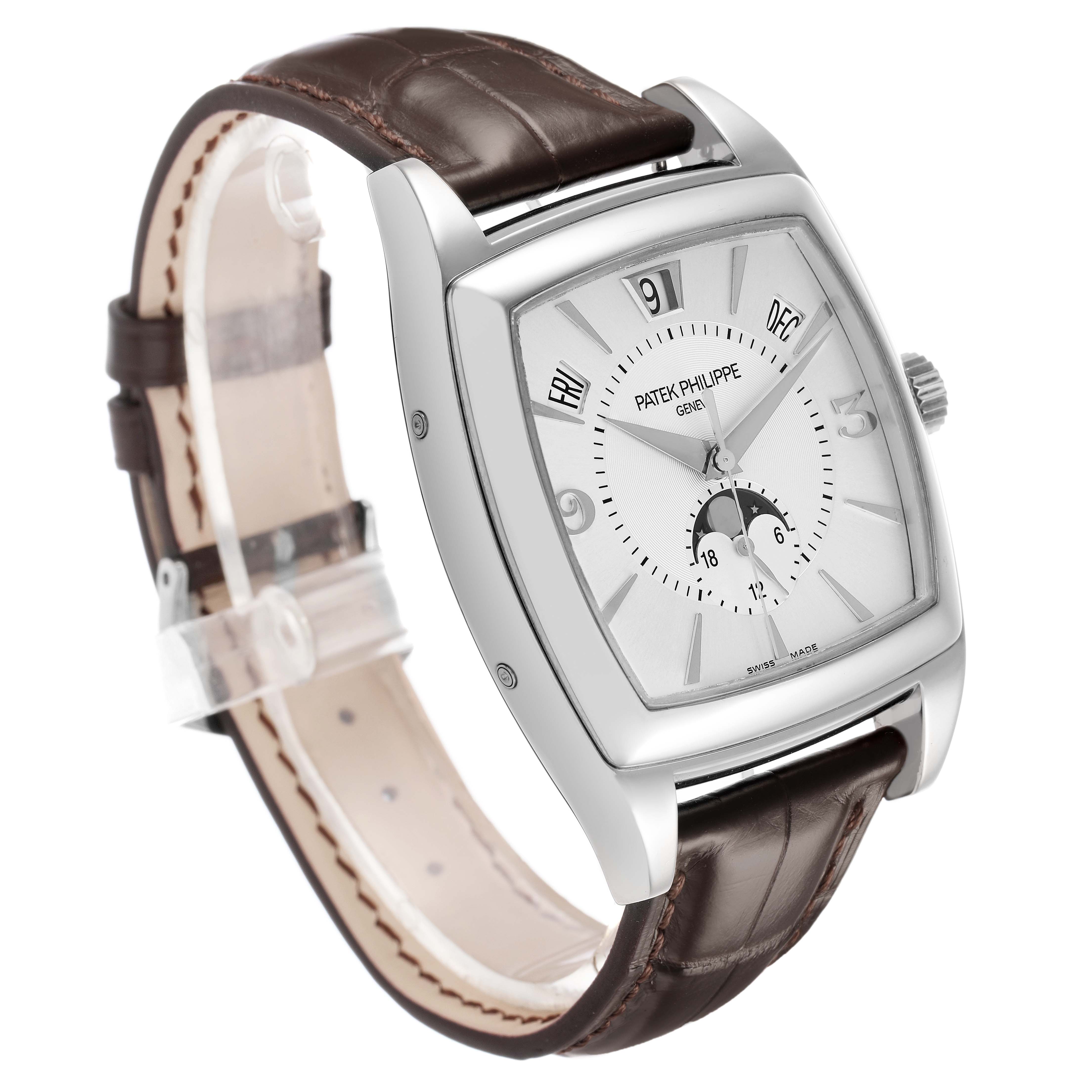 The Patek Philippe Gondolo 5135G-001 Men's White Gold Silver Dial watch is shown at a three-quarter angle, highlighting the dial, case, and leather strap.