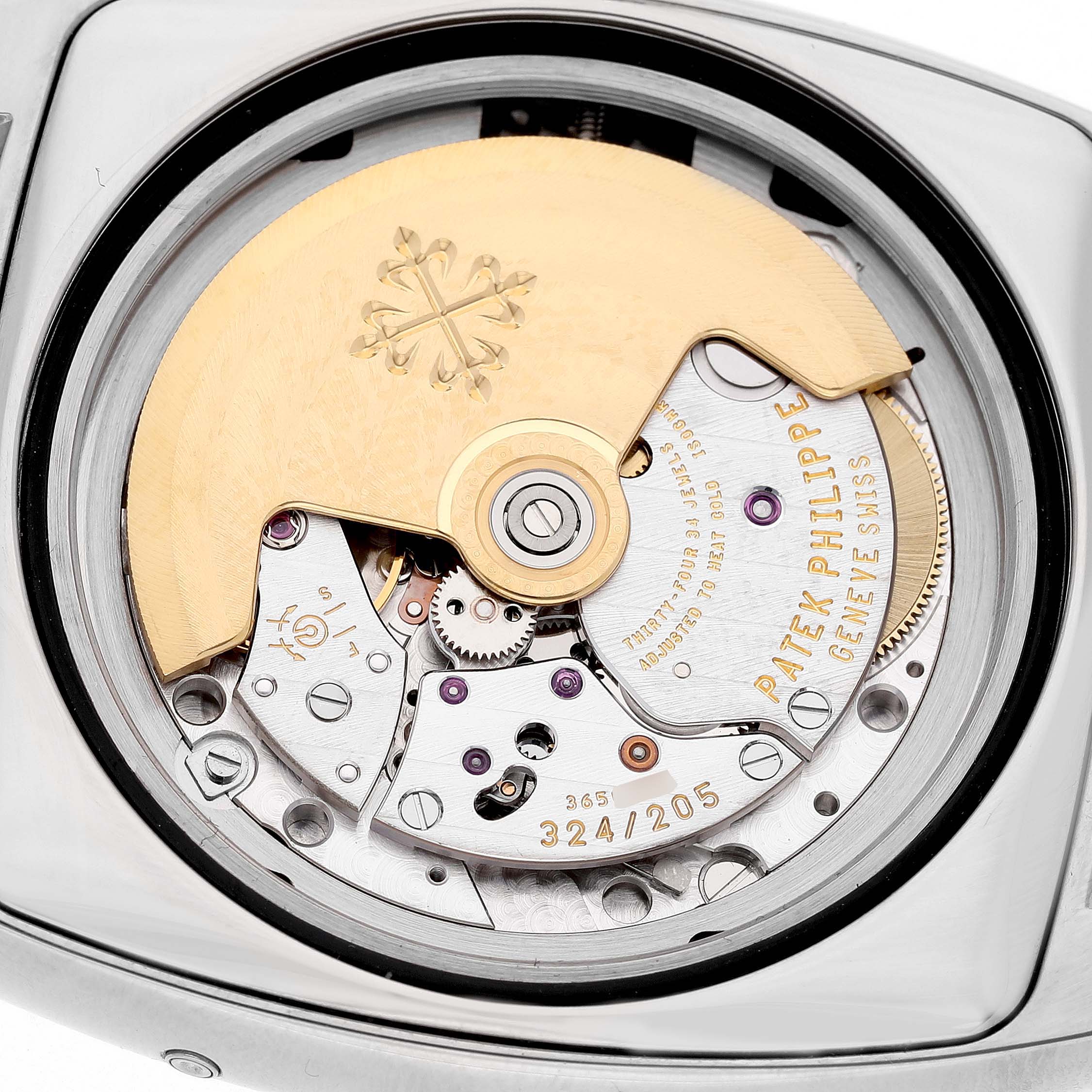 The Patek Philippe Gondolo 5135G-001 Men's White Gold Silver Dial watch is shown from the back, highlighting its movement and rotor.