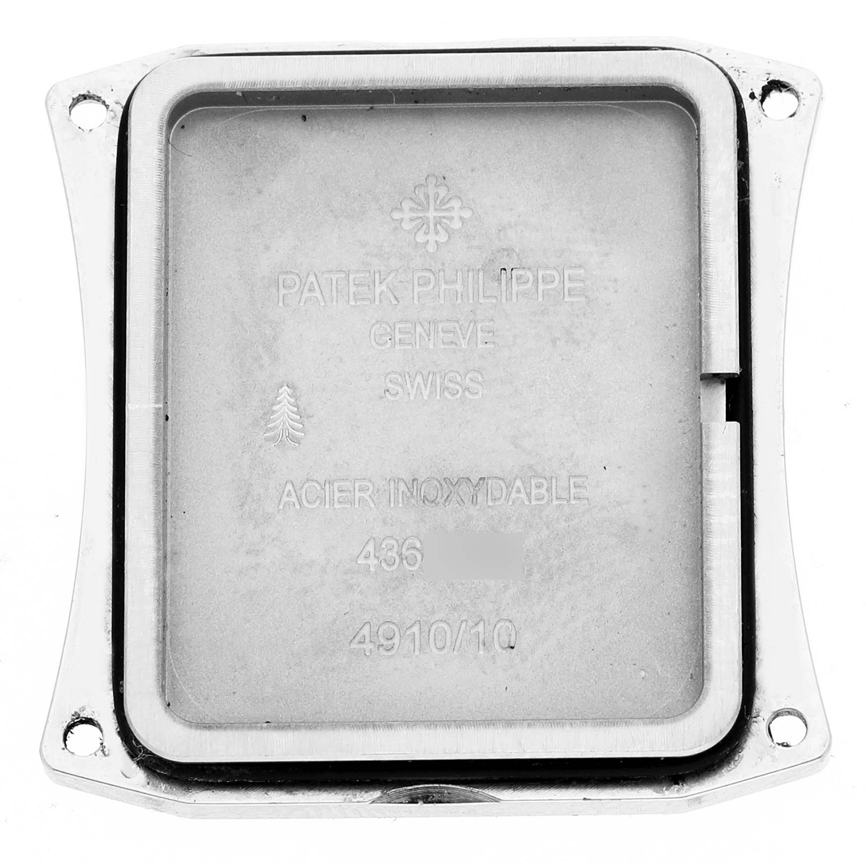 The image shows the back casing of a Patek Philippe Twenty-4 4910 Women's Stainless Steel Silver Dial 4910 Women's Stainless Steel Silver Dial watch, highlighting its engravings and metal composition.