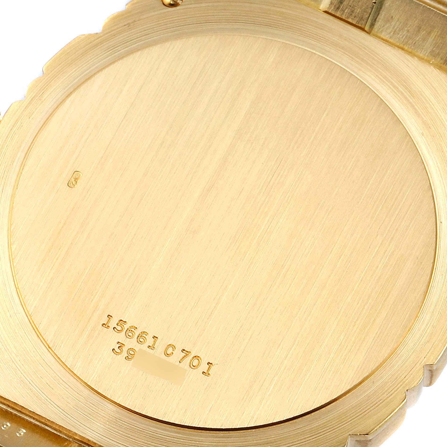 This image shows the back case of the Piaget 15661C701 Men's Yellow Gold Champagne Dial 15661C701 Men's Yellow Gold Champagne Dial Polo 18K Yellow Gold Champagne Dial Mens Watch 15561 model.