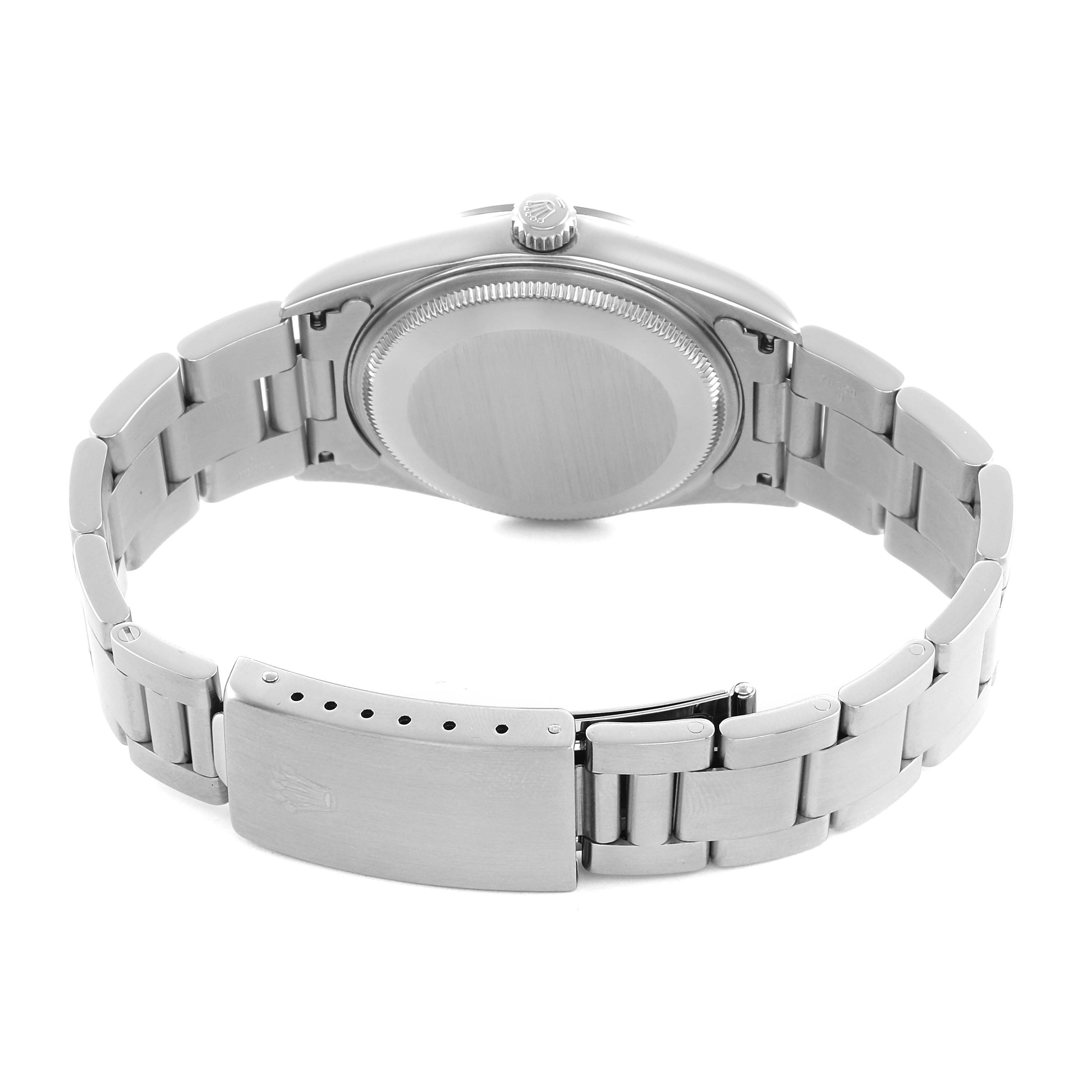 The image shows the back of a Rolex Air-King 14000 Men's Stainless Steel Silver Dial watch, featuring the case back, crown, and bracelet with the clasp open.