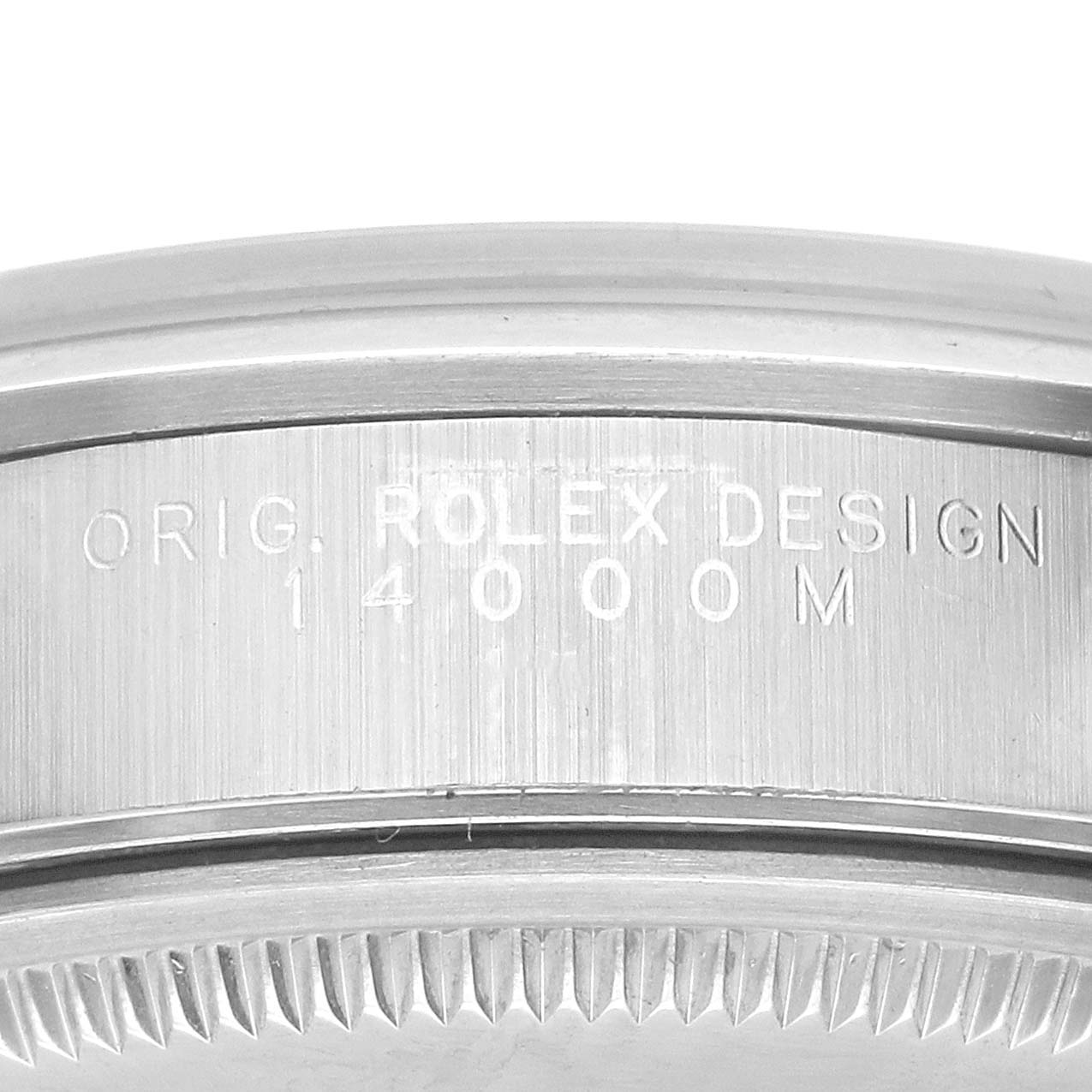 The image shows the engraved side of the case on a Rolex Air-King 14000 Men's Stainless Steel Silver Dial, highlighting the model number and Rolex design engraving.