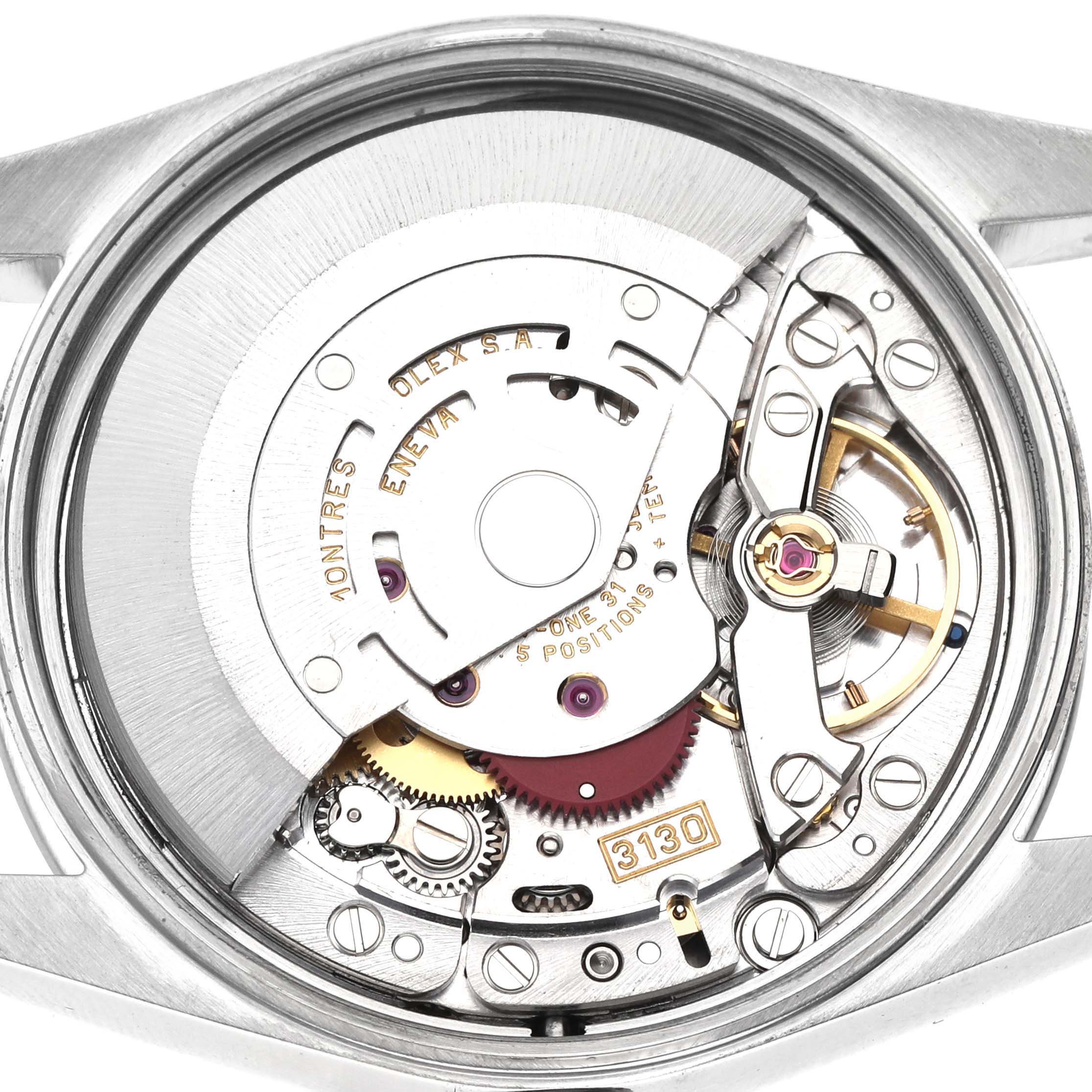 The image shows the movement of a Rolex Air-King 14000 Men's Stainless Steel Silver Dial watch from the back, showcasing its intricate mechanical components.
