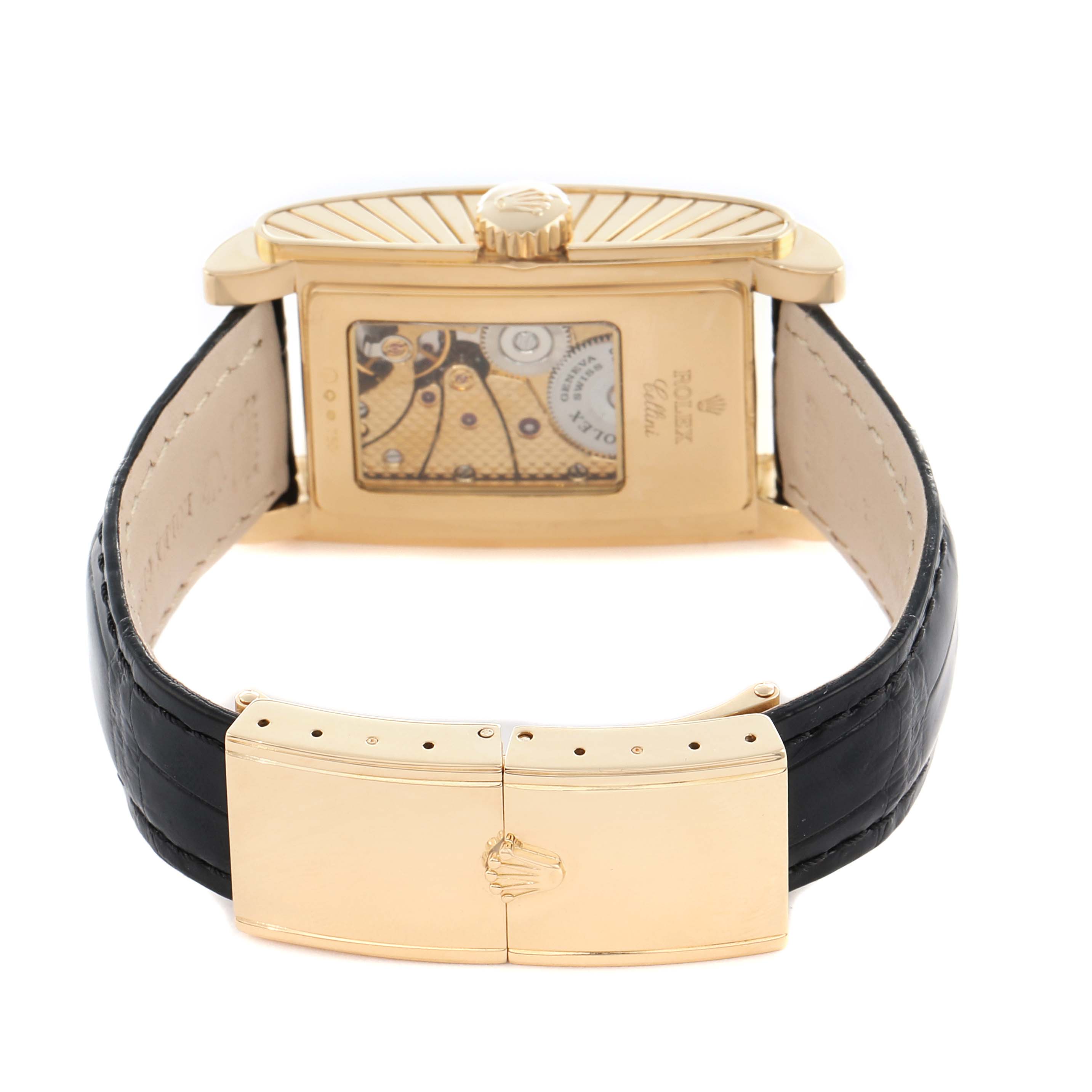 The image shows the back view of a Rolex Cellini 5440 Men's Yellow Gold Champagne Dial watch, highlighting its open case back and clasp on the leather strap.