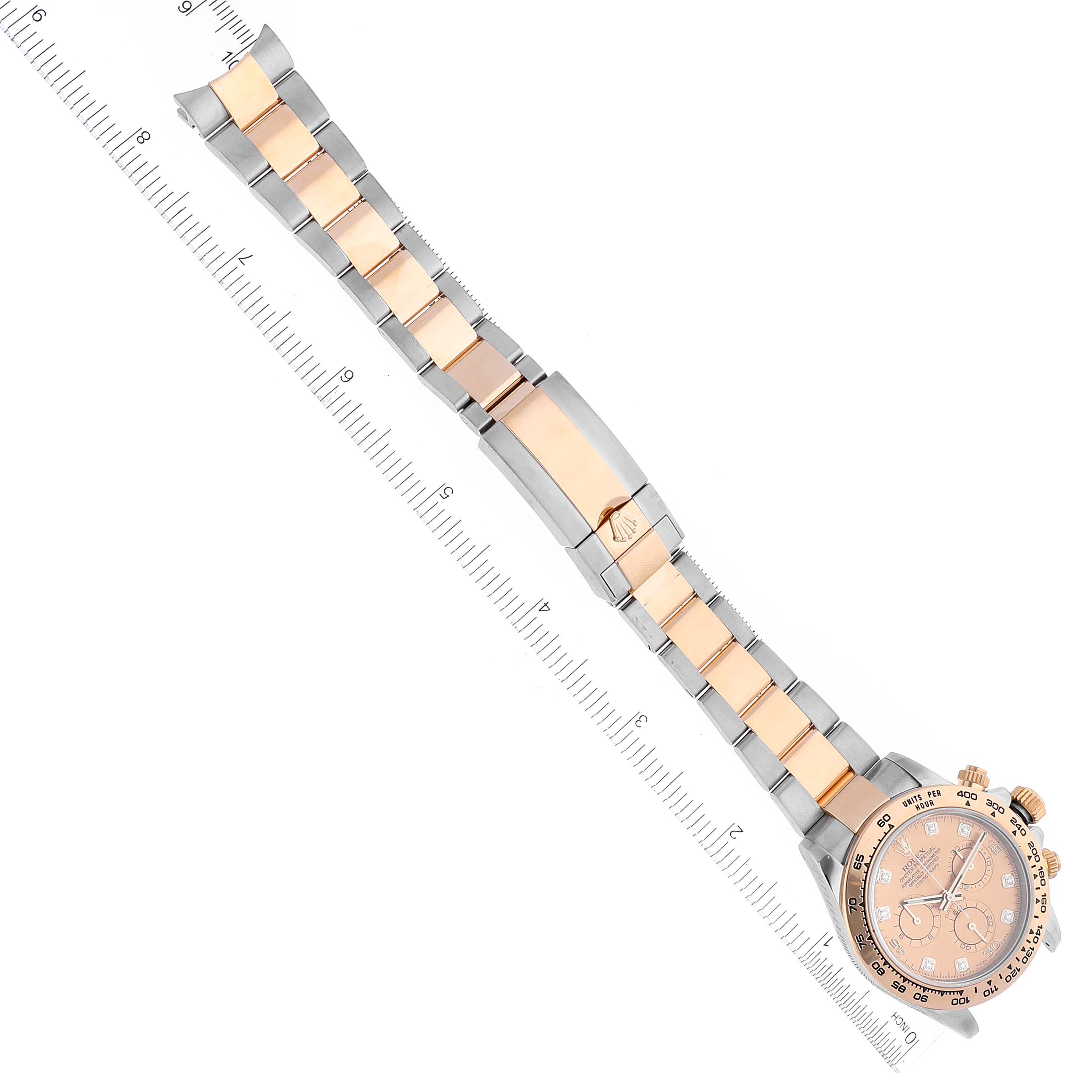 The Rolex Daytona 116503 Men
s Steel and Gold (two tone) Champagne Dial 116503 Men
s Steel and Gold (two tone) Champagne Dial watch is shown from an overhead angle, displaying its band, clasp, and face.