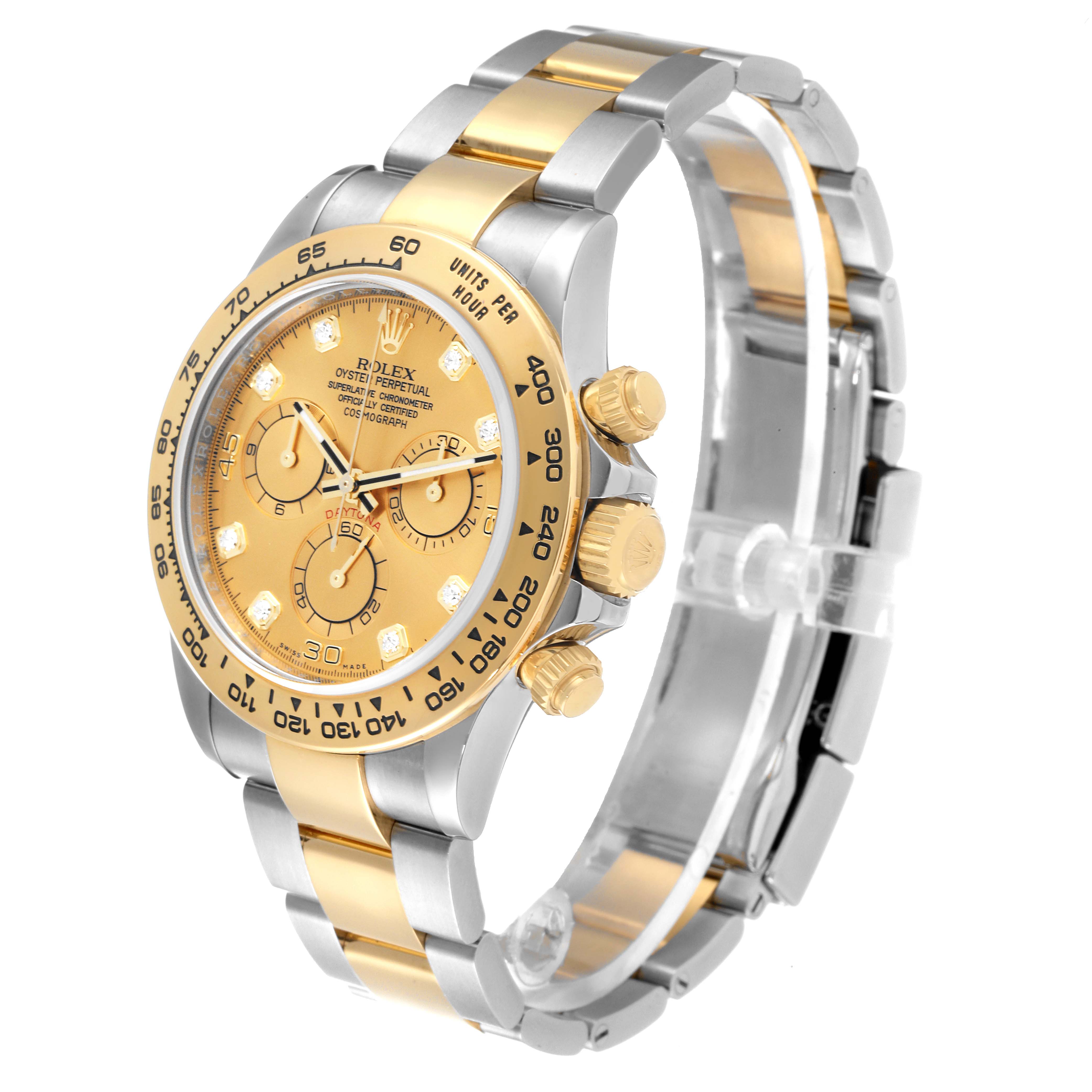 This image shows a side-angle view of a Rolex Daytona 116503 Men
s Steel and Gold (two tone) Champagne Dial 116503 Men
s Steel and Gold (two tone) Champagne Dial watch, highlighting its gold and silver bracelet, bezel, and dial.