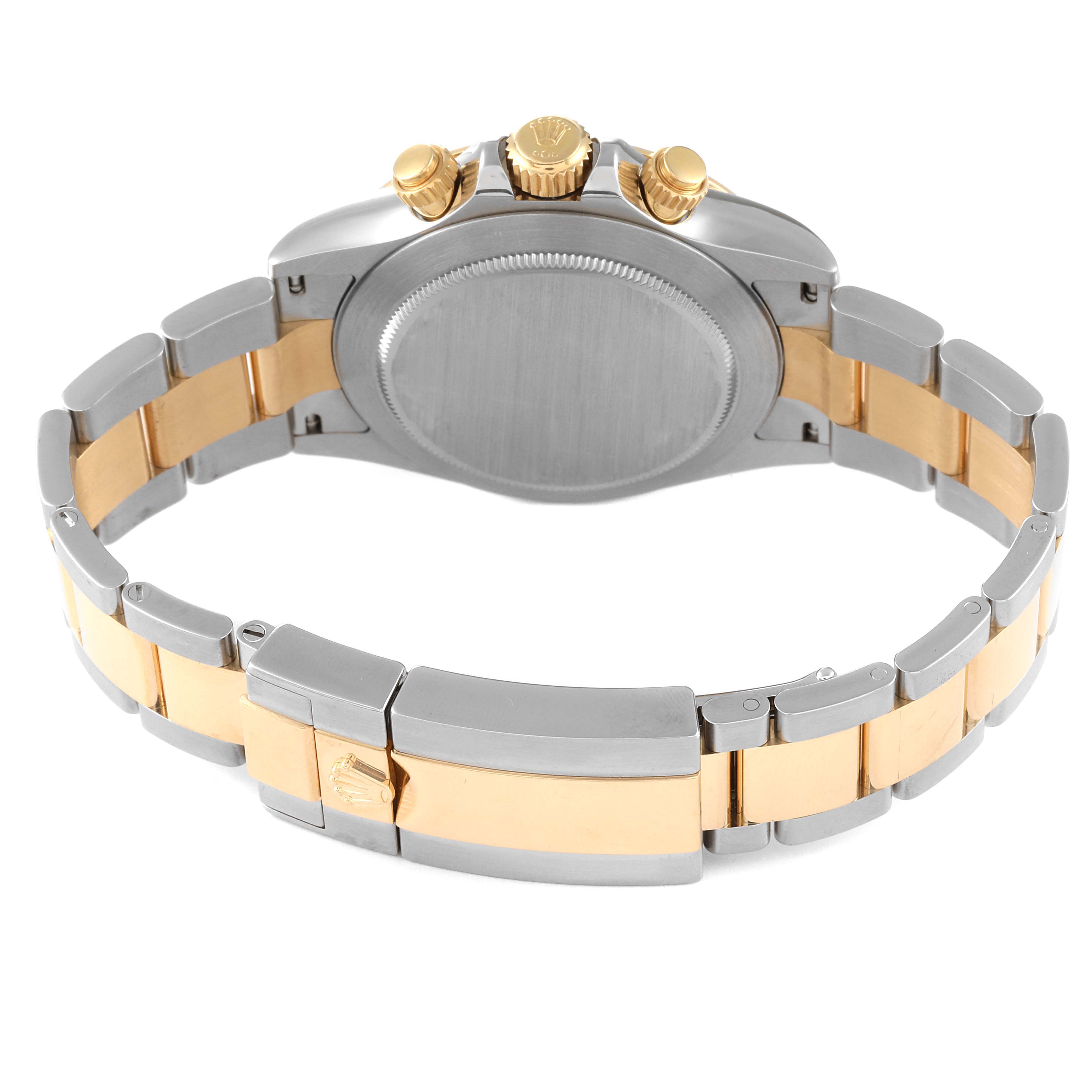 The image shows the back and side view of a Rolex Daytona 116503 Men
s Steel and Gold (two tone) Champagne Dial 116503 Men
s Steel and Gold (two tone) Champagne Dial watch, highlighting the case, clasp, and two-tone bracelet.