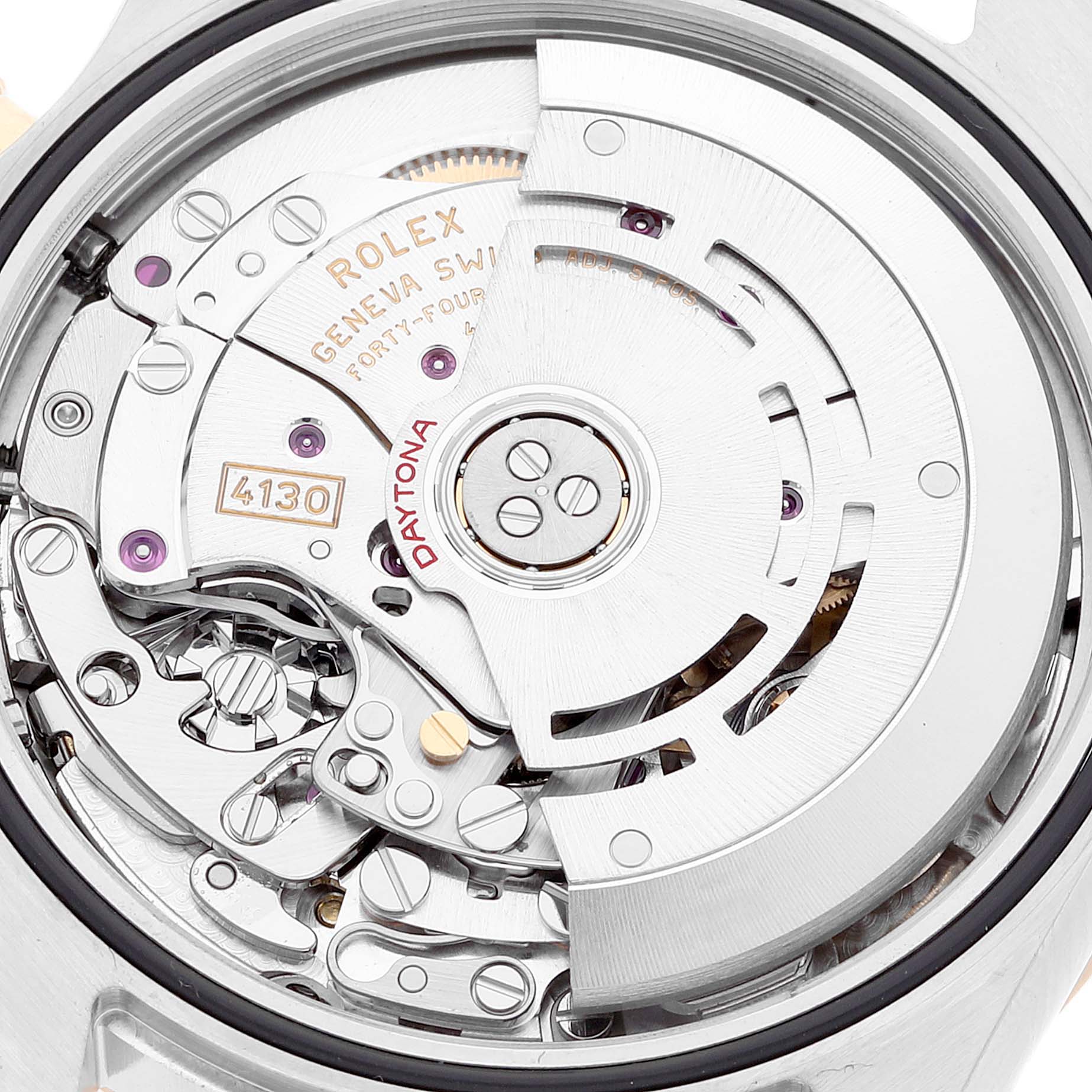 This image shows the movement of a Rolex Daytona 116503 Men
s Steel and Gold (two tone) Champagne Dial 116503 Men
s Steel and Gold (two tone) Champagne Dial watch at a top-down angle, with visible gears and the "4130" caliber.