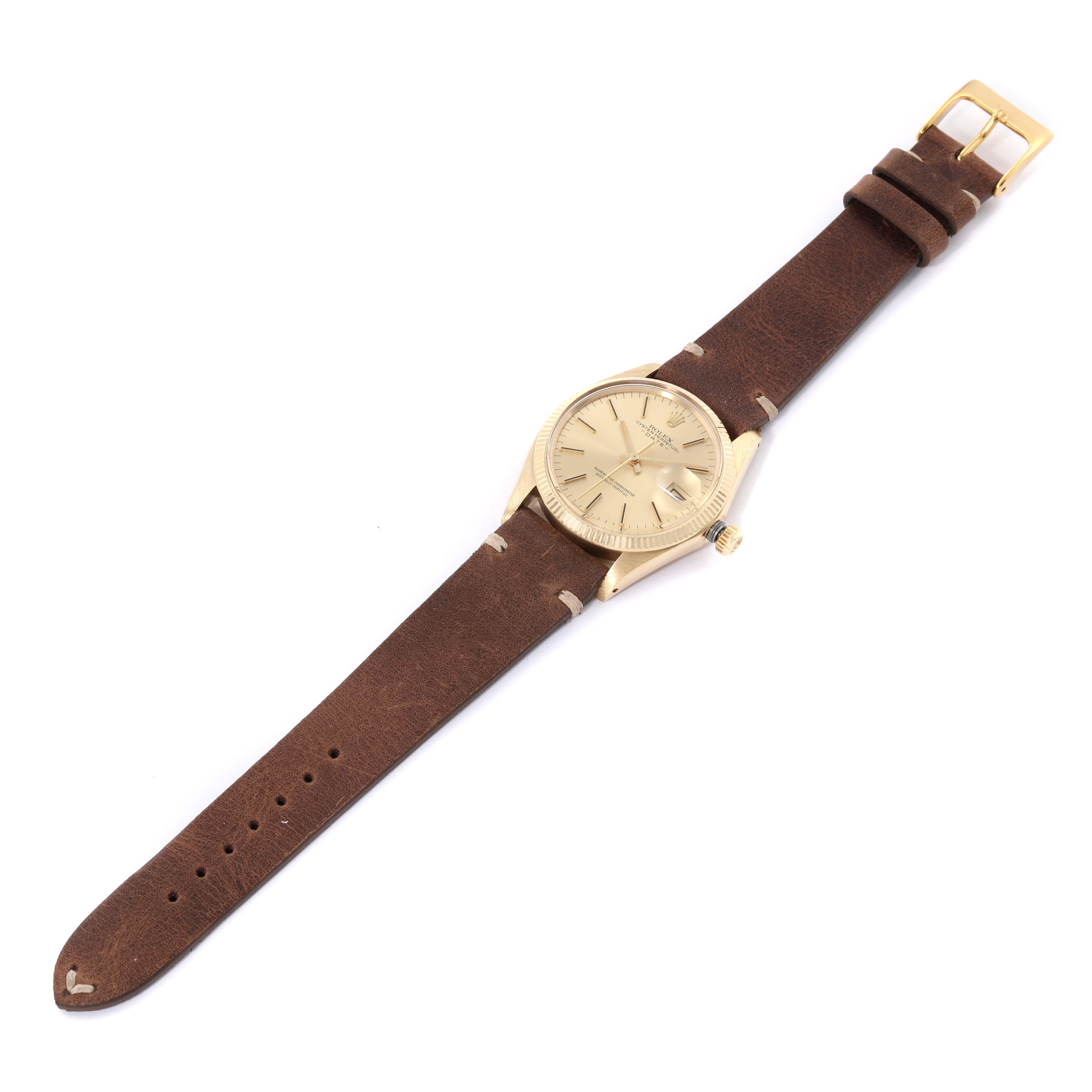 The Rolex Vintage Collection 1503 Men's Yellow Gold Champagne Dial 1503 Men's Yellow Gold Champagne Dial model watch is shown from a top-down angle, displaying its face, bezel, crown, and leather strap.