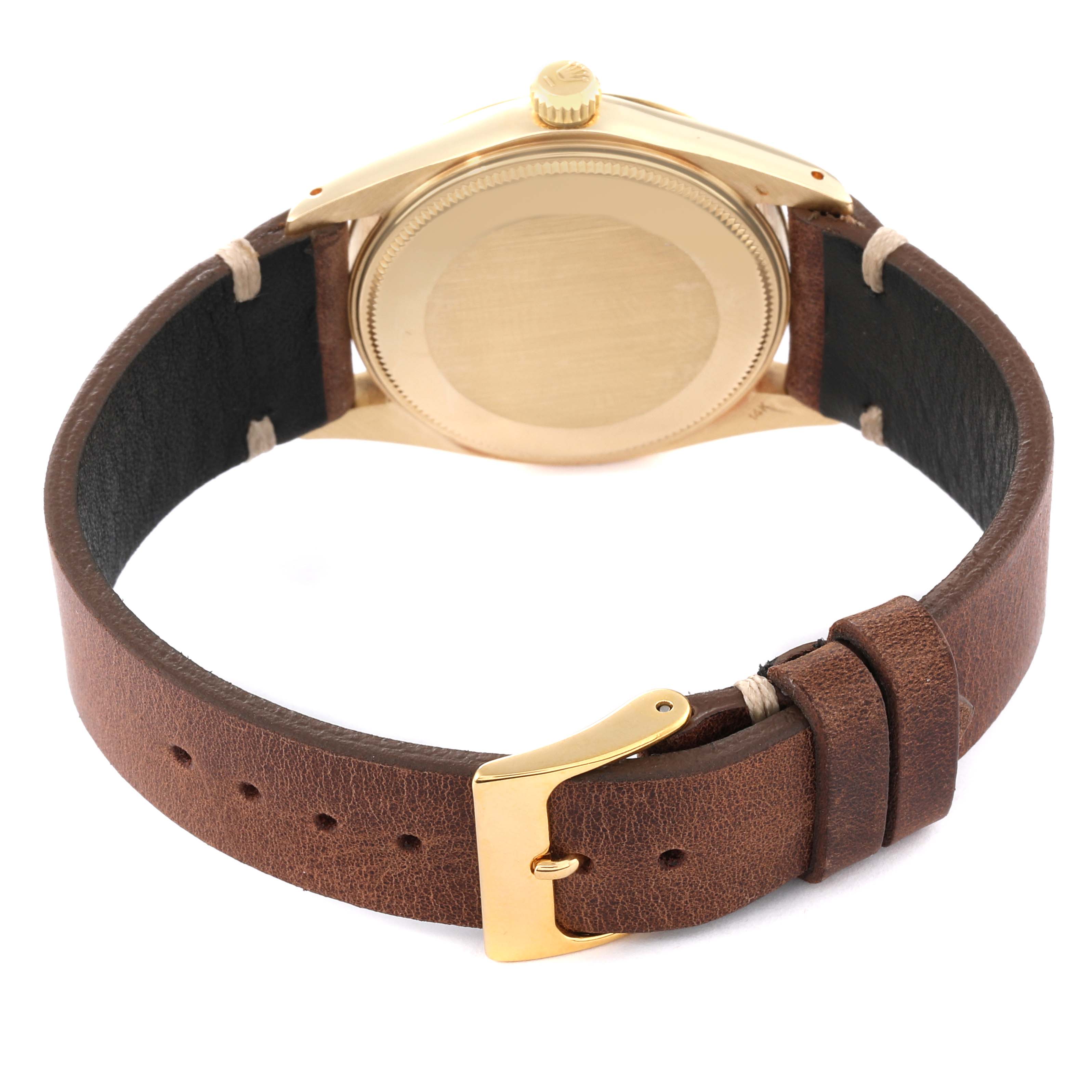 The image shows the back view of the Rolex Vintage Collection 1503 Men's Yellow Gold Champagne Dial 1503 Men's Yellow Gold Champagne Dial watch, focusing on the case back and leather strap with a gold buckle.