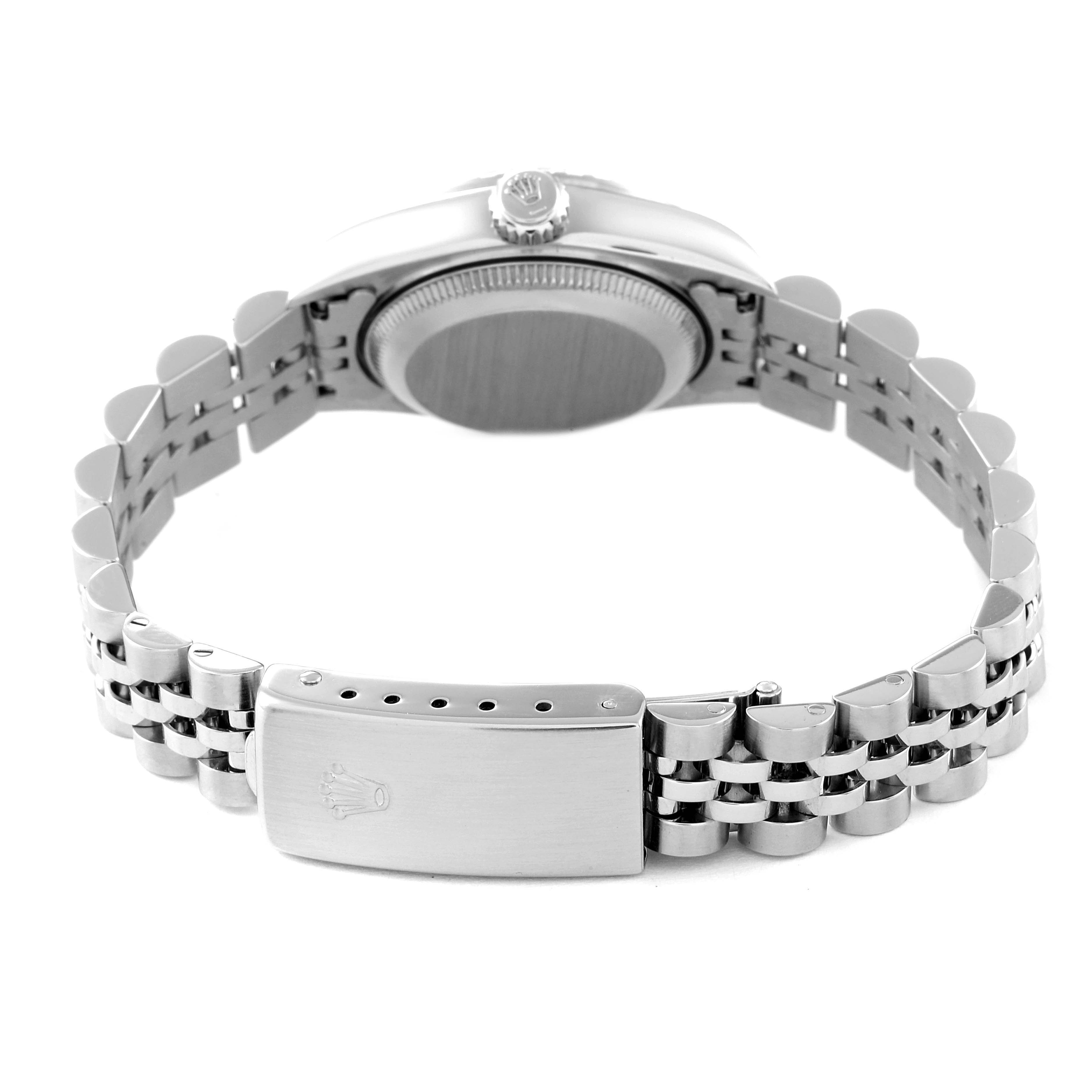 This image shows the back view of a Rolex Date 79240 Women
s Stainless Steel Blue Dial 79240 Women
s Stainless Steel Blue Dial watch, highlighting the case back, bracelet, and clasp.