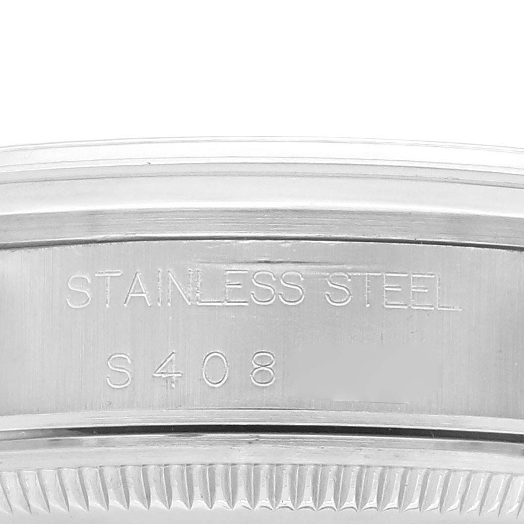 The image shows a close-up of the stainless steel case back of a Rolex Date 15200 Men's Stainless Steel Silver Dial 15200 Men's Stainless Steel Silver Dial model.