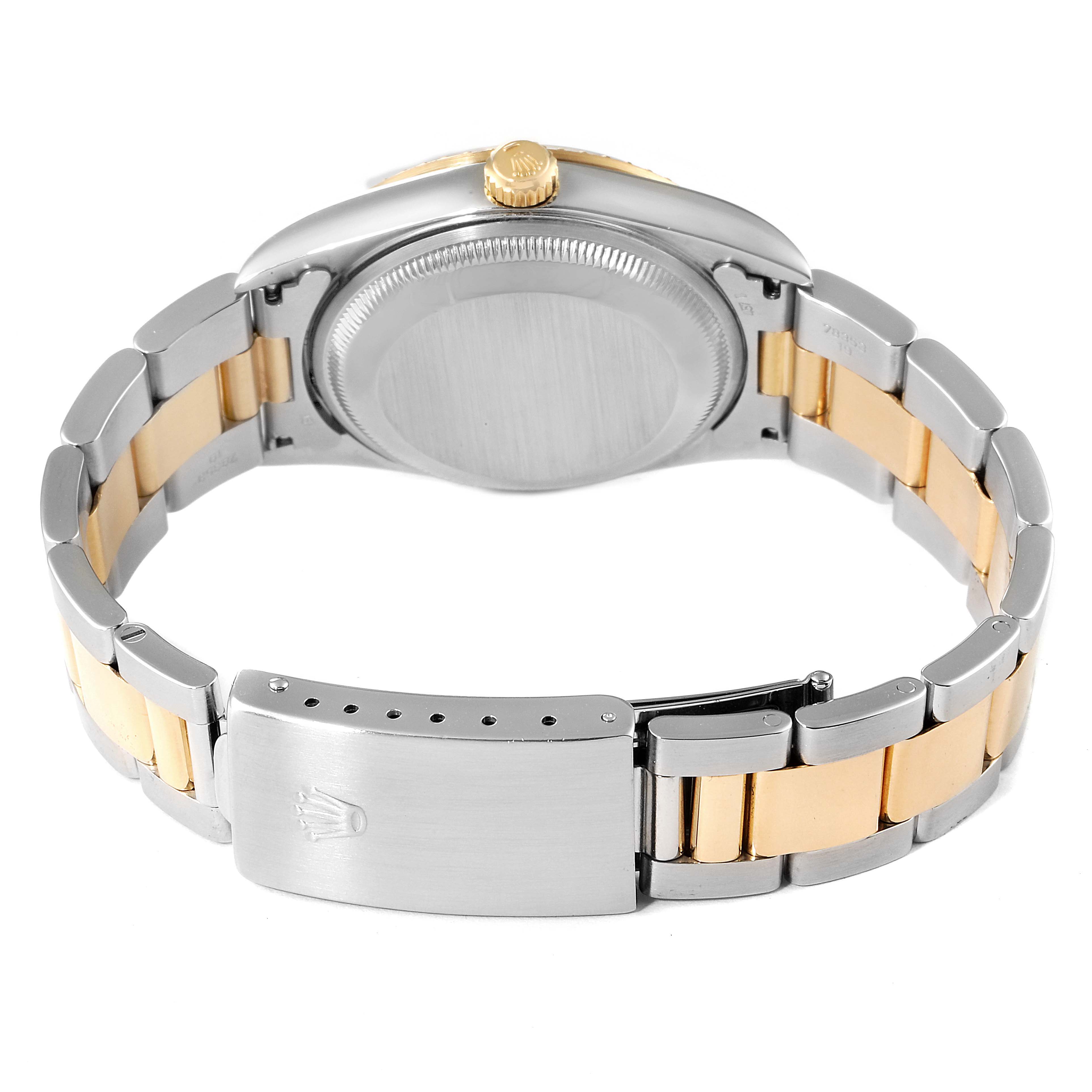 The image shows the backside and clasp of a Rolex Datejust 15223 Men's Steel and Gold (two tone) Blue Dial 15223 Men's Steel and Gold (two tone) Blue Dial watch, featuring a two-tone metal bracelet.