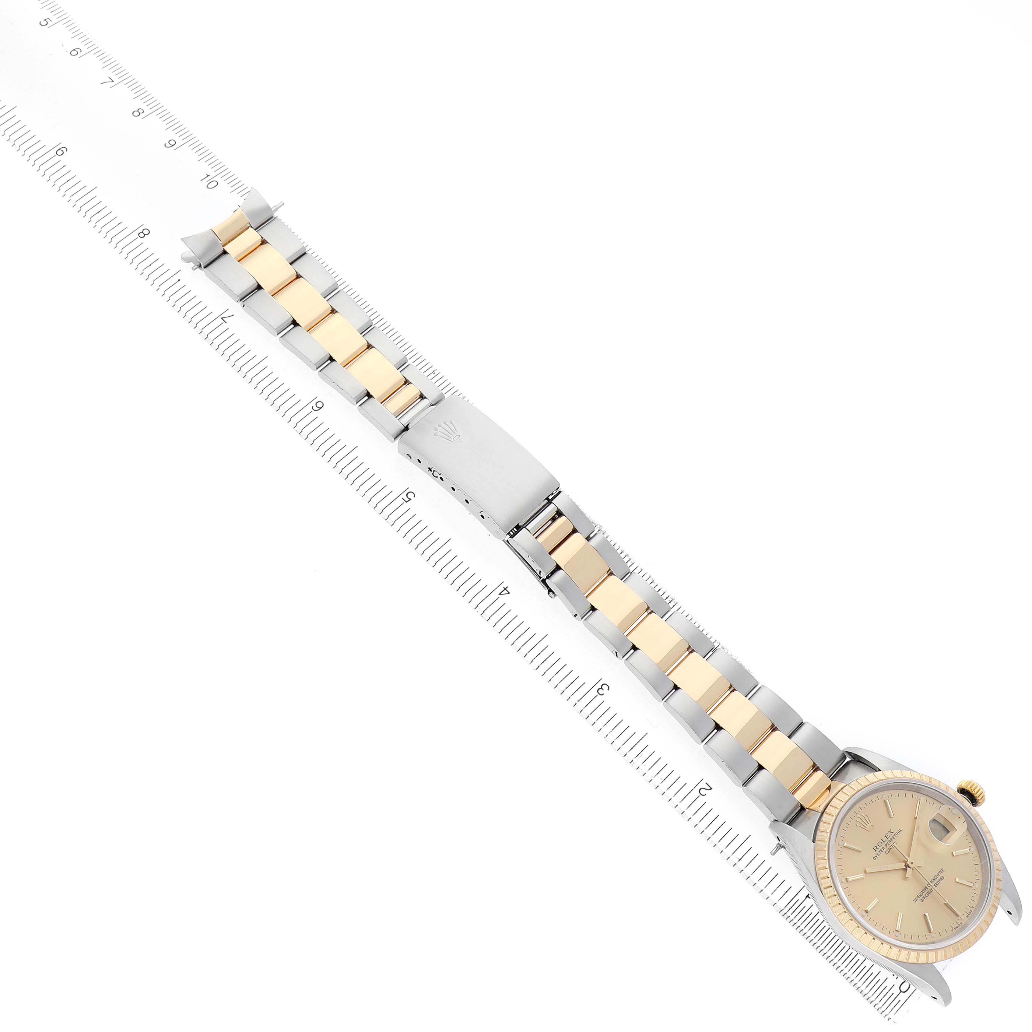 The Rolex Date 15223 Men's Steel and Gold (two tone) Champagne Dial model watch is shown diagonally from above, displaying the full bracelet, case, and dial.