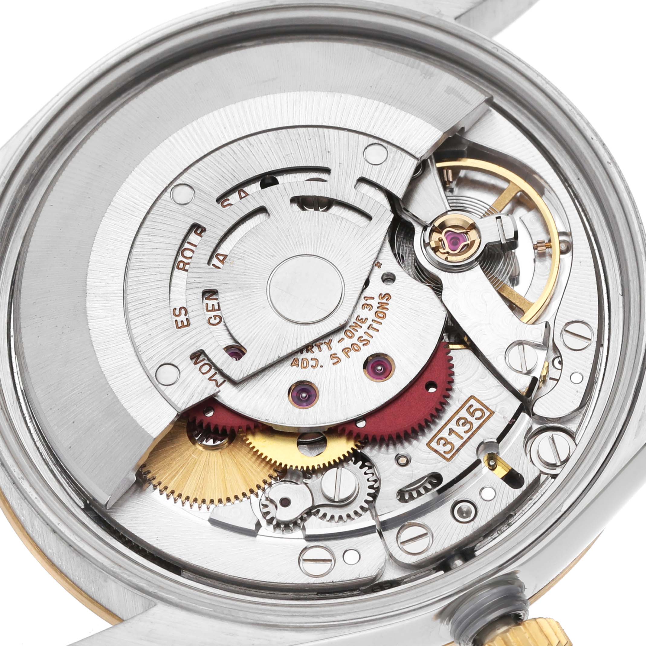 The image shows the movement of a Rolex Date 15223 Men's Steel and Gold (two tone) Champagne Dial, displaying gears, rotor, and balance wheel in a close-up, detailed view.