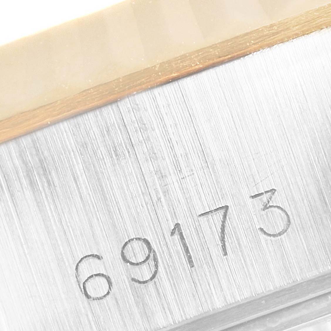 The image shows a close-up of the case side of a Rolex Datejust 69173 Women's Steel and Gold (two tone) Champagne Dial 69173 Women's Steel and Gold (two tone) Champagne Dial model, displaying the model number "69173."