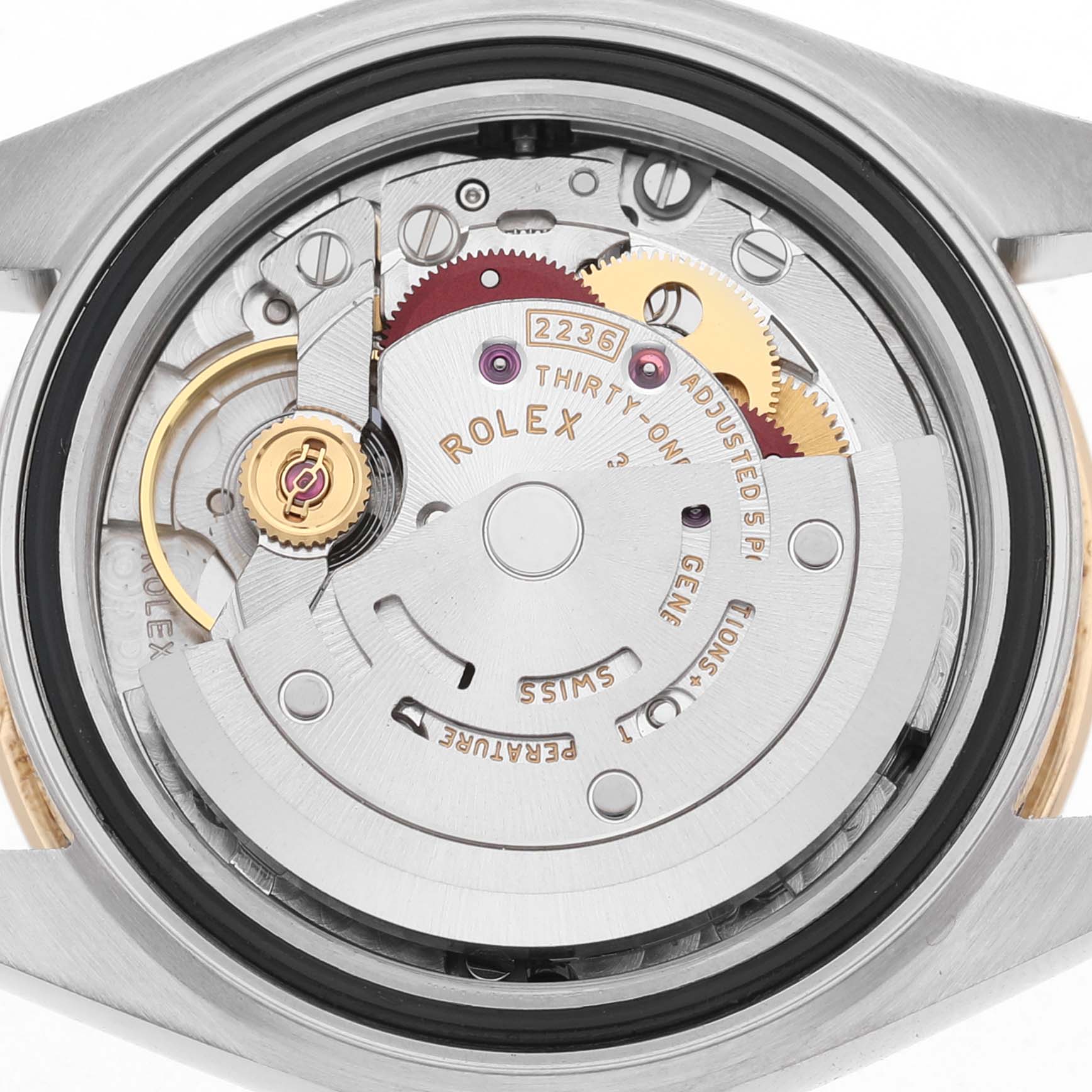 The image shows the movement of a Rolex Datejust 279173 Women's Steel and Gold (two tone) Mother of Pearl Dial from the back, highlighting gears and the balance wheel.