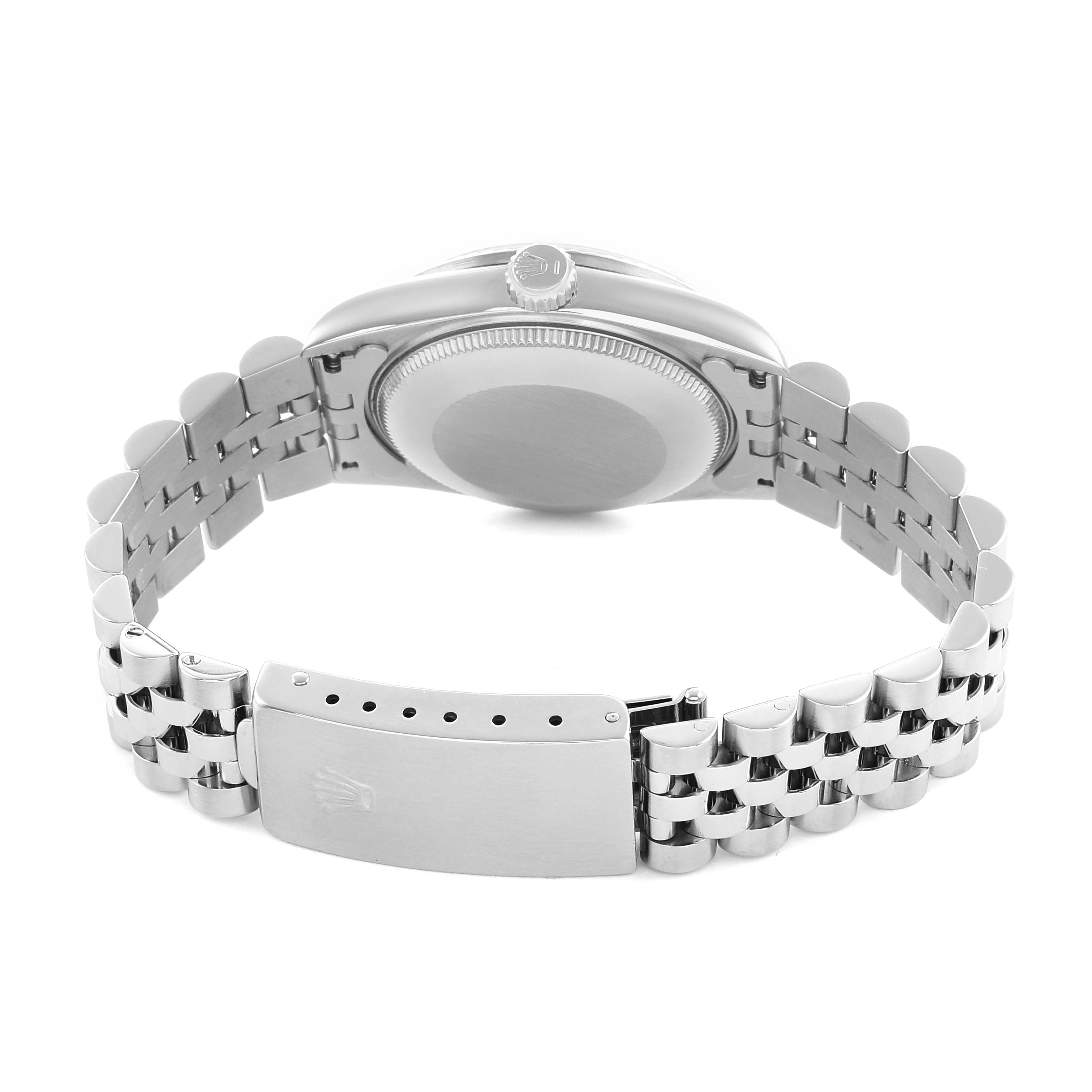 The image shows the backside of a Rolex Datejust 68274 Women's Stainless Steel Silver Dial, highlighting the case back, crown, and Jubilee bracelet with clasp.