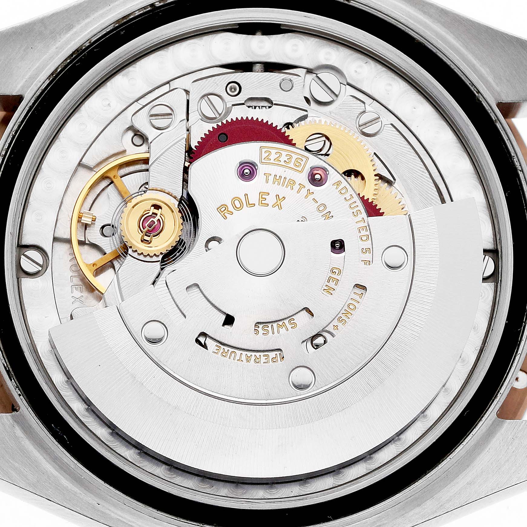 The image shows the back view of a Rolex Datejust Women's Steel and Gold (two tone) Pink Dial movement, displaying the rotor and gears.