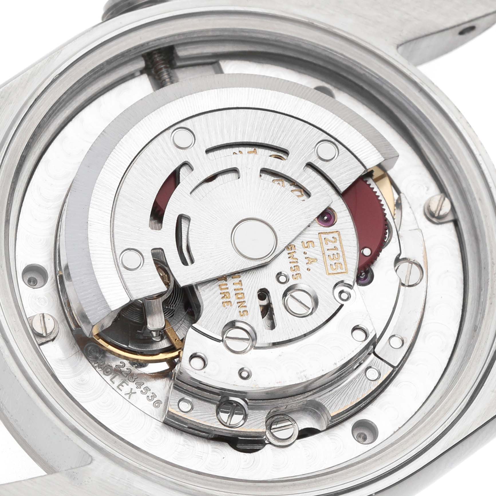 The image shows the movement of a Rolex Datejust 68274 Women's Stainless Steel Black Dial watch from a top-down angle, highlighting the rotor and balance wheel.