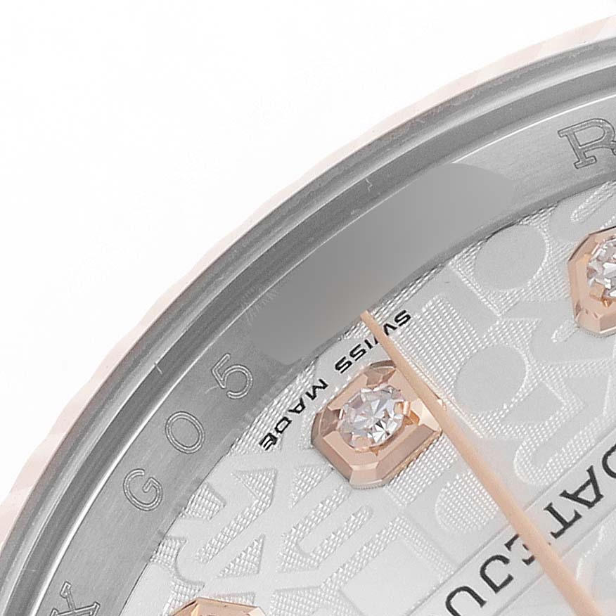 The image shows a close-up of the dial and part of the bezel of a Rolex Datejust 116231 Men's Steel and Gold (two tone) Silver Dial, featuring diamond hour markers.
