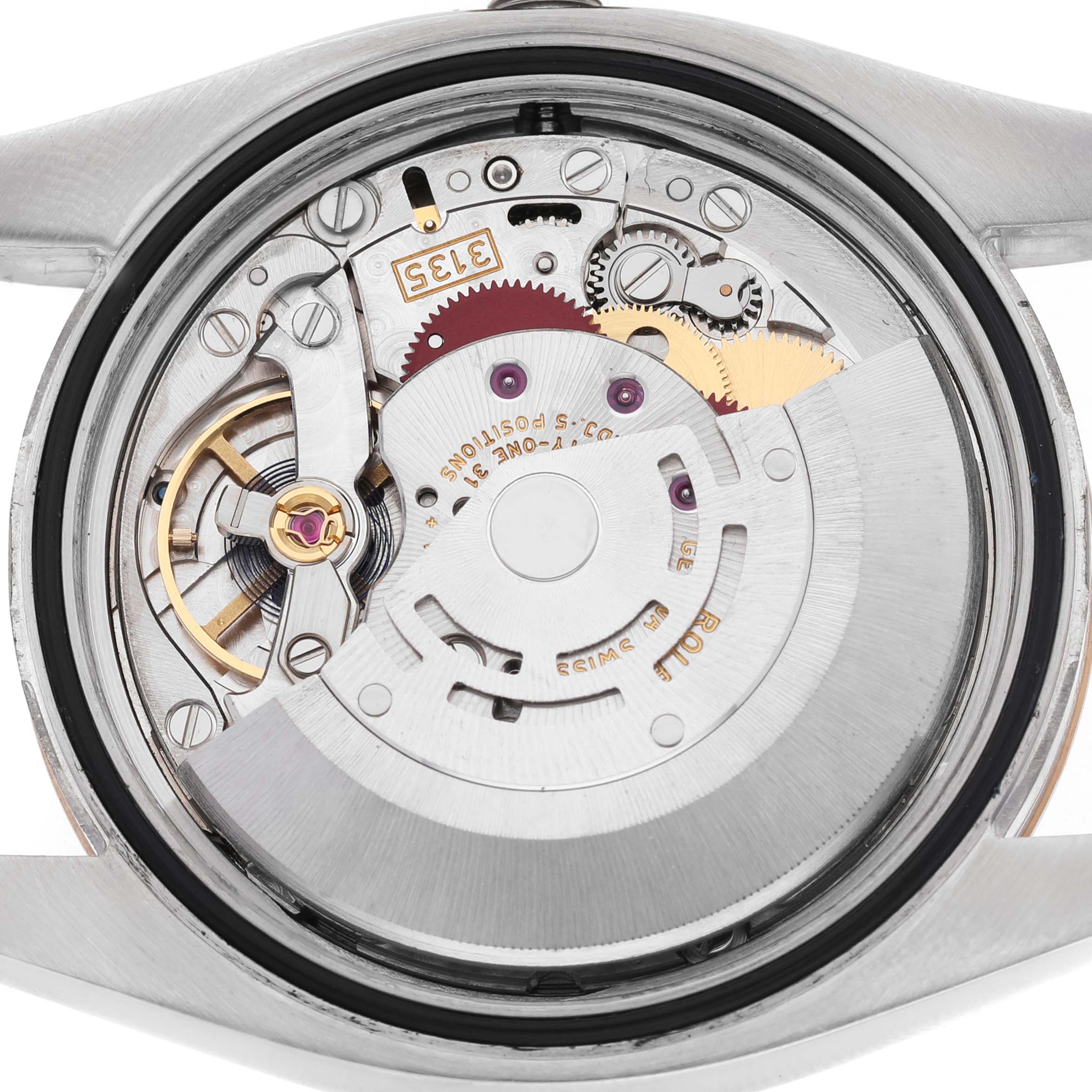 The image shows the movement and internal mechanisms of a Rolex Datejust 116231 Men's Steel and Gold (two tone) Silver Dial model from the back.