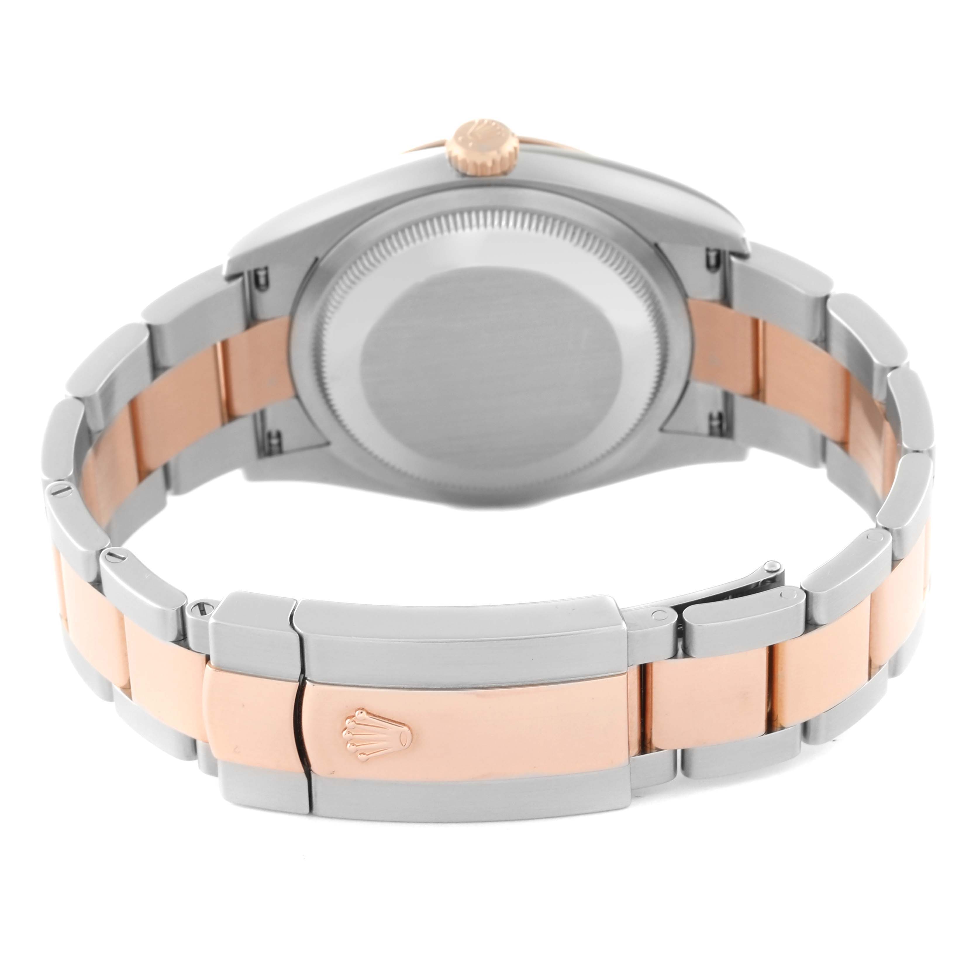 This image shows the back of the Rolex Datejust 126201 Men's Steel and Gold (two tone) Grey Dial 126201 Men's Steel and Gold (two tone) Grey Dial watch, highlighting the case, bracelet, and clasp with the Rolex logo.