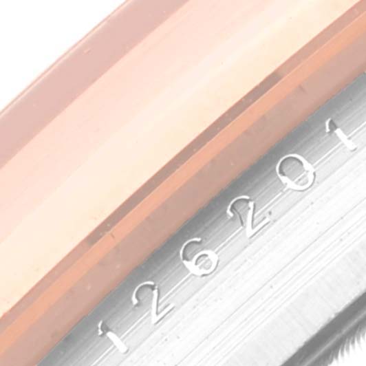 The image shows a close-up of the Rolex Datejust 126201 Men's Steel and Gold (two tone) Grey Dial 126201 Men's Steel and Gold (two tone) Grey Dial's case side, focusing on the engraved reference number.