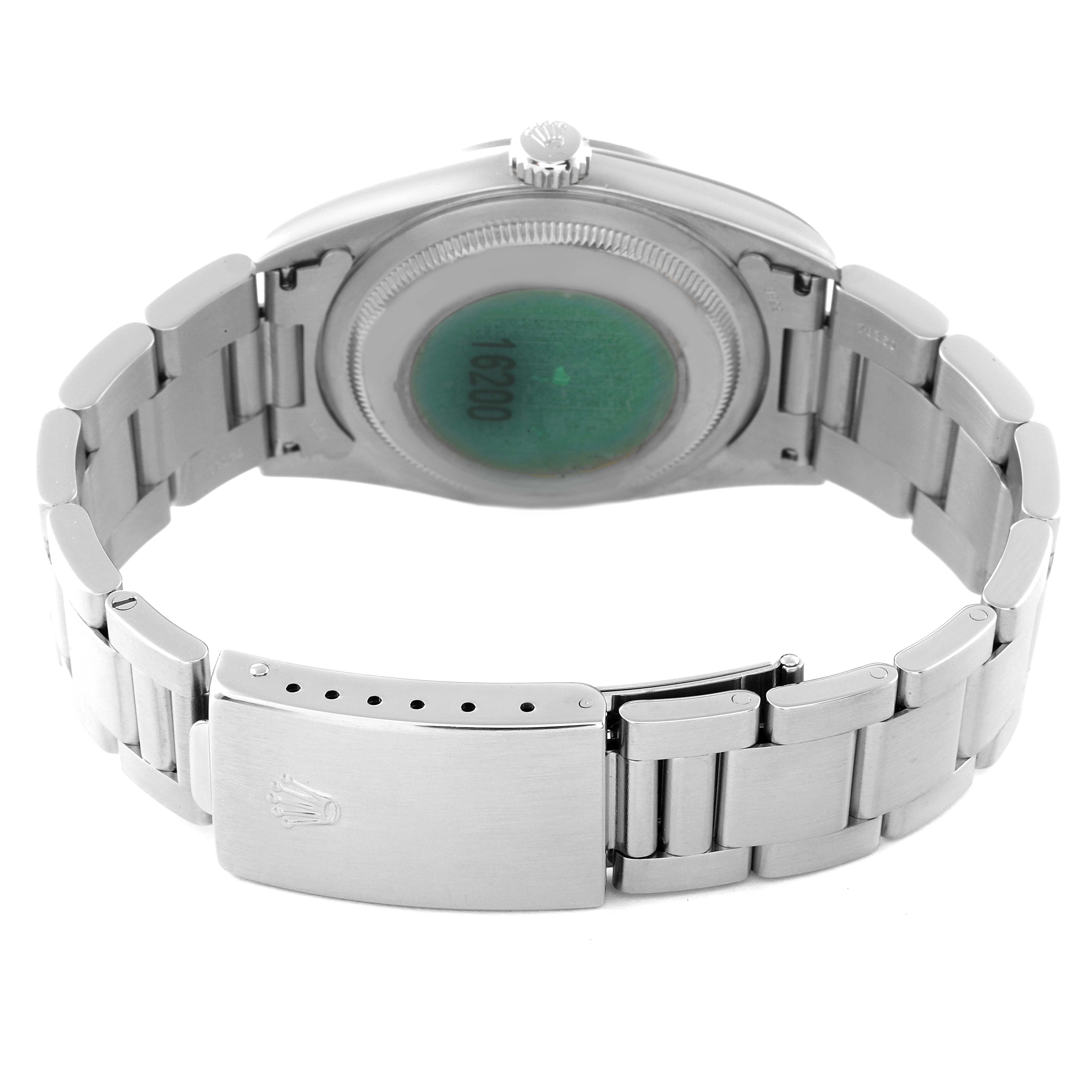 The image shows the back view of a Rolex Datejust 16200 Men's Stainless Steel Silver Dial 16200 Men's Stainless Steel Silver Dial watch, focusing on the case back and part of the bracelet with the clasp.