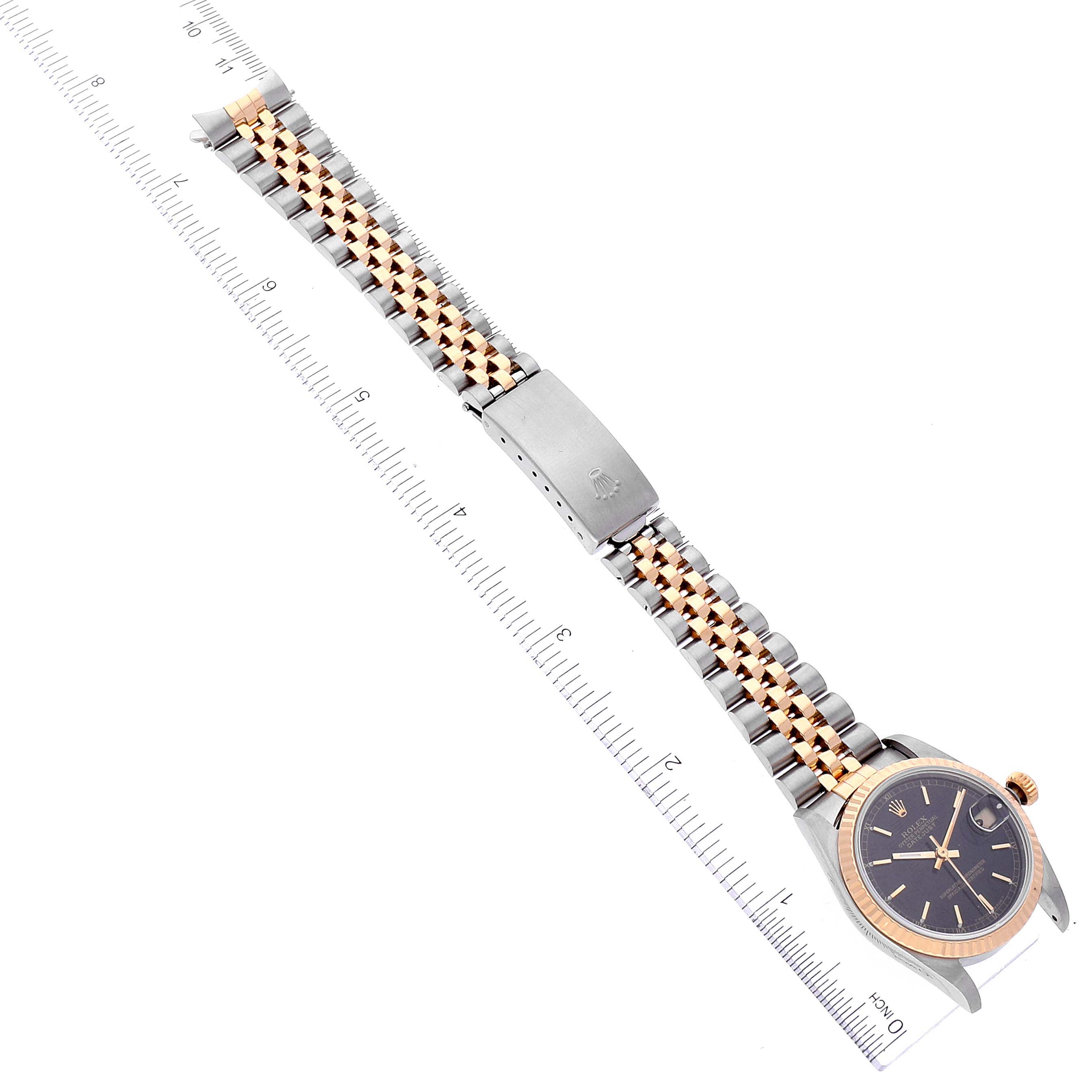 The image shows a top view of the Rolex Datejust 68273 Women's Steel and Gold (two tone) Black Dial 68273 Women's Steel and Gold (two tone) Black Dial watch, highlighting the watch face, bezel, and two-tone bracelet with a clasp.