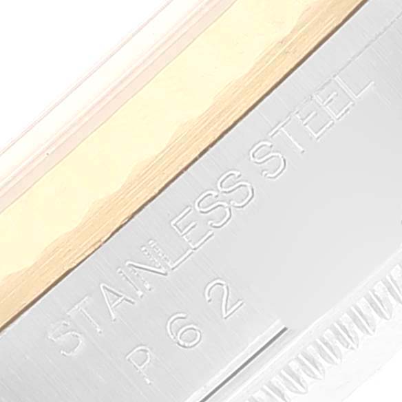 This close-up image shows the side engraving of a Rolex Datejust 16233 Men
s Steel and Gold (two tone) Grey Dial 16233 Men
s Steel and Gold (two tone) Grey Dial watch, highlighting the "STAINLESS STEEL" marking.