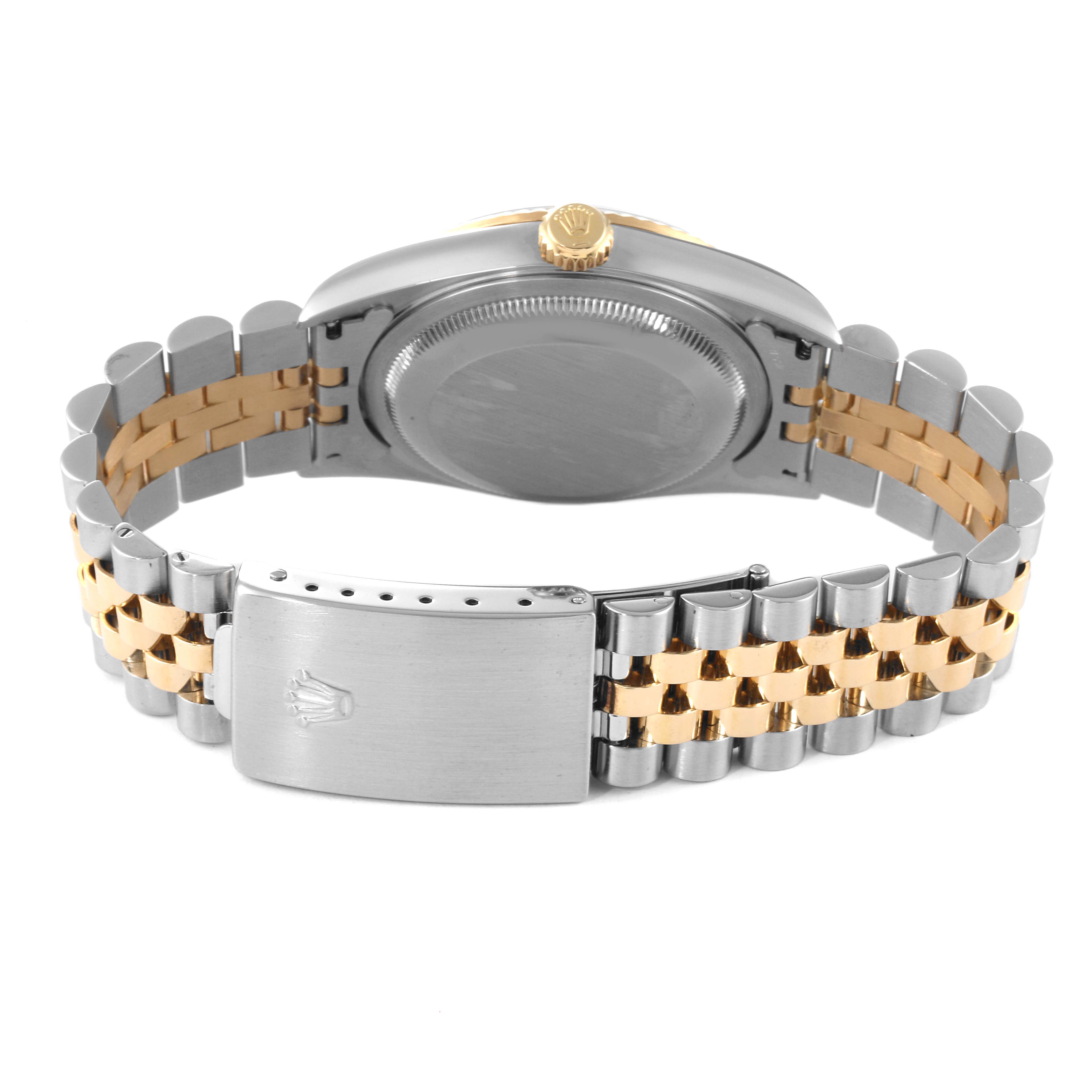 The image shows the back case and bracelet clasp of a Rolex Datejust 16233 Men
s Steel and Gold (two tone) Grey Dial 16233 Men
s Steel and Gold (two tone) Grey Dial watch from a rear angle.