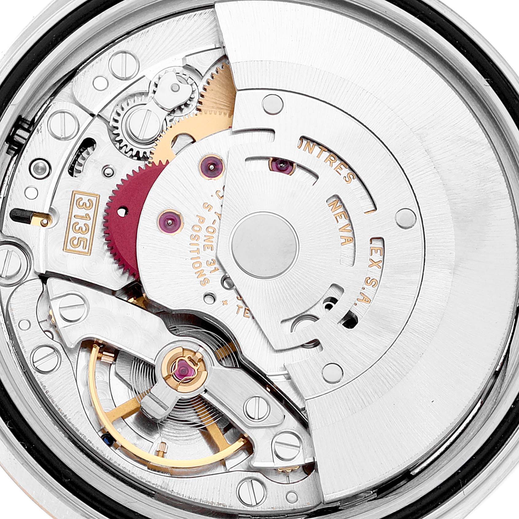 This image shows a close-up view of the movement mechanism inside a Rolex Datejust 16233 Men
s Steel and Gold (two tone) Grey Dial 16233 Men
s Steel and Gold (two tone) Grey Dial watch.