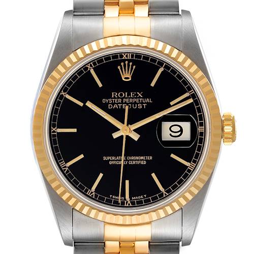 The image shows a front-facing view of a Rolex Datejust watch, highlighting its two-tone bracelet, fluted bezel, black dial, and date window.