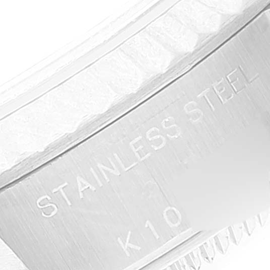 This image shows a close-up of the stainless steel part on the inner side of a Rolex Datejust 79174 Women's Stainless Steel Silver Dial 79174 Women's Stainless Steel Silver Dial watch case.