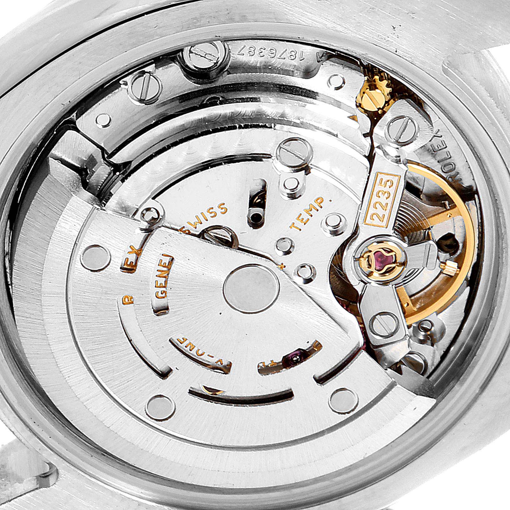 The image shows a close-up view of the movement mechanism of a Rolex Datejust 179174 Women
s Stainless Steel White Dial 179174 Women
s Stainless Steel White Dial watch.