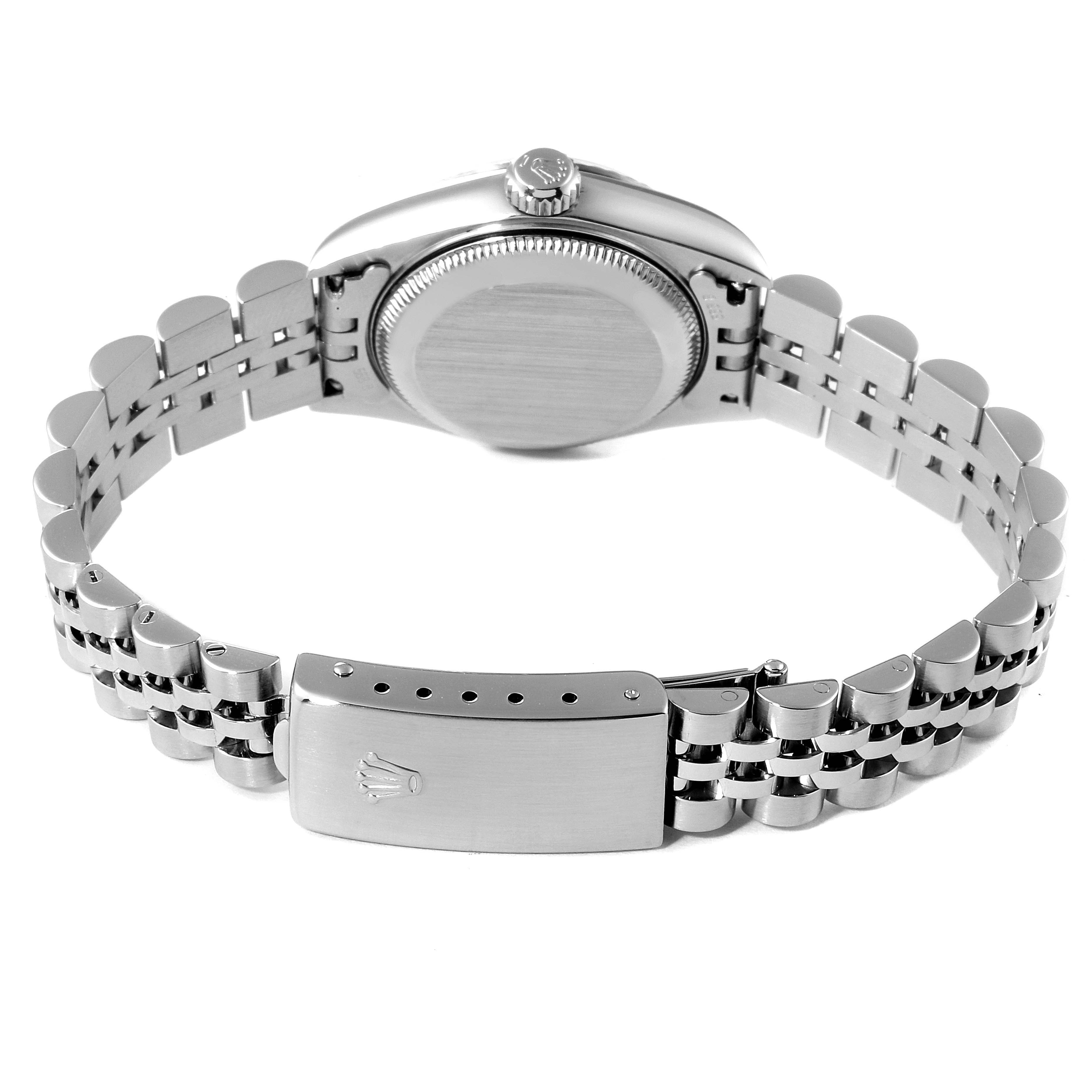 The image shows the back angle of a Rolex Datejust 79174 Women's Stainless Steel Mother of Pearl Dial 79174 Women's Stainless Steel Mother of Pearl Dial watch, highlighting its clasp and bracelet.