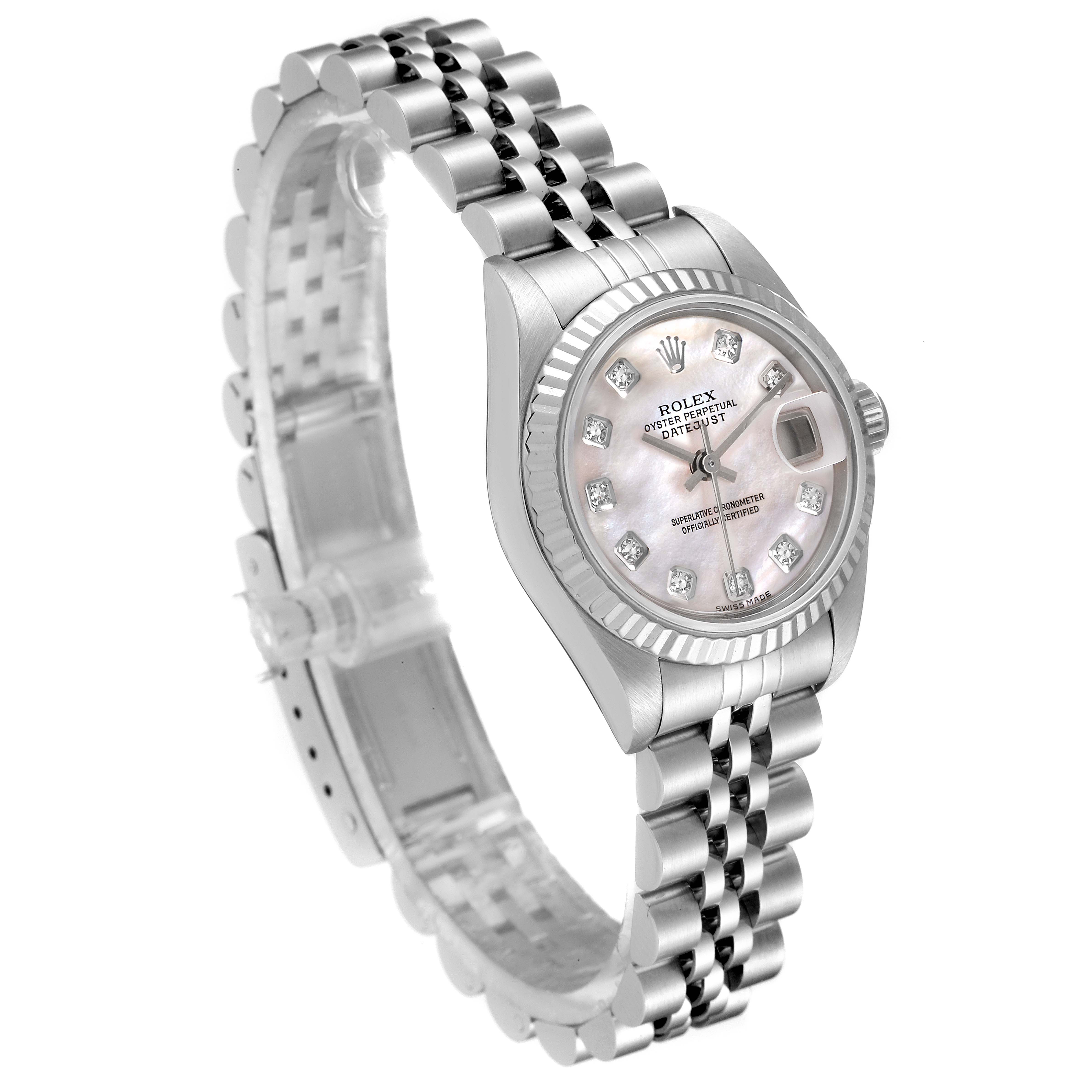 The image shows a Rolex Datejust 79174 Women's Stainless Steel Mother of Pearl Dial 79174 Women's Stainless Steel Mother of Pearl Dial watch at an angled view, highlighting its face, bezel, and stainless steel bracelet.