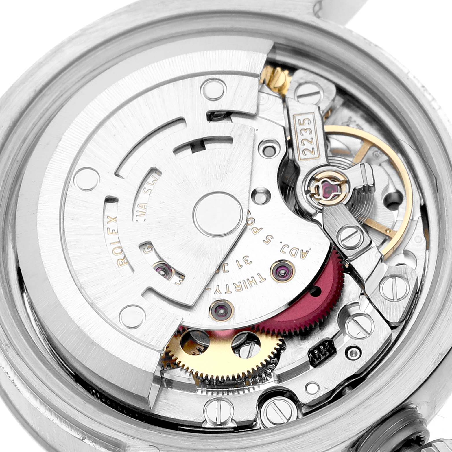 The image shows a close-up of the movement mechanism inside a Rolex Datejust 179174 Women's Stainless Steel White Dial watch from a top-down angle.