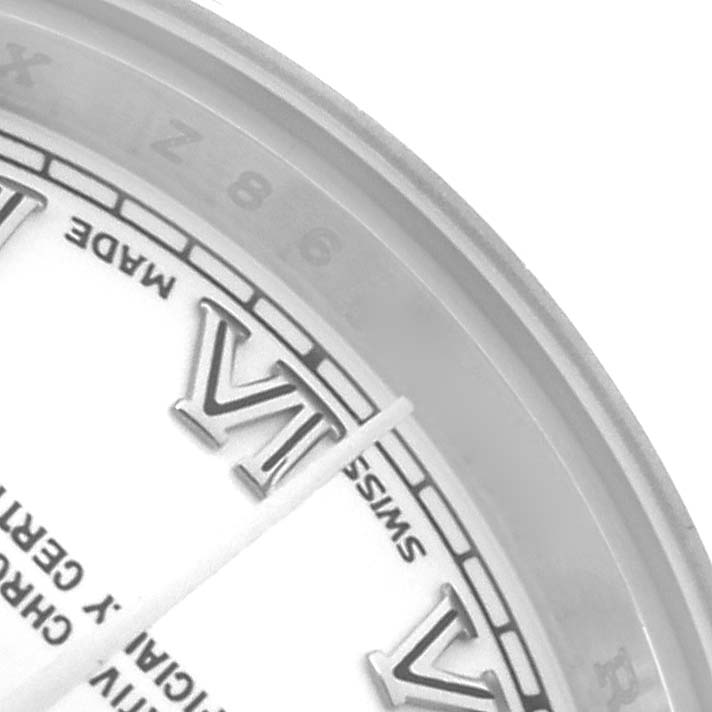 This image shows a close-up of the dial and bezel of a Rolex Datejust 179174 Women's Stainless Steel White Dial, featuring Roman numerals.